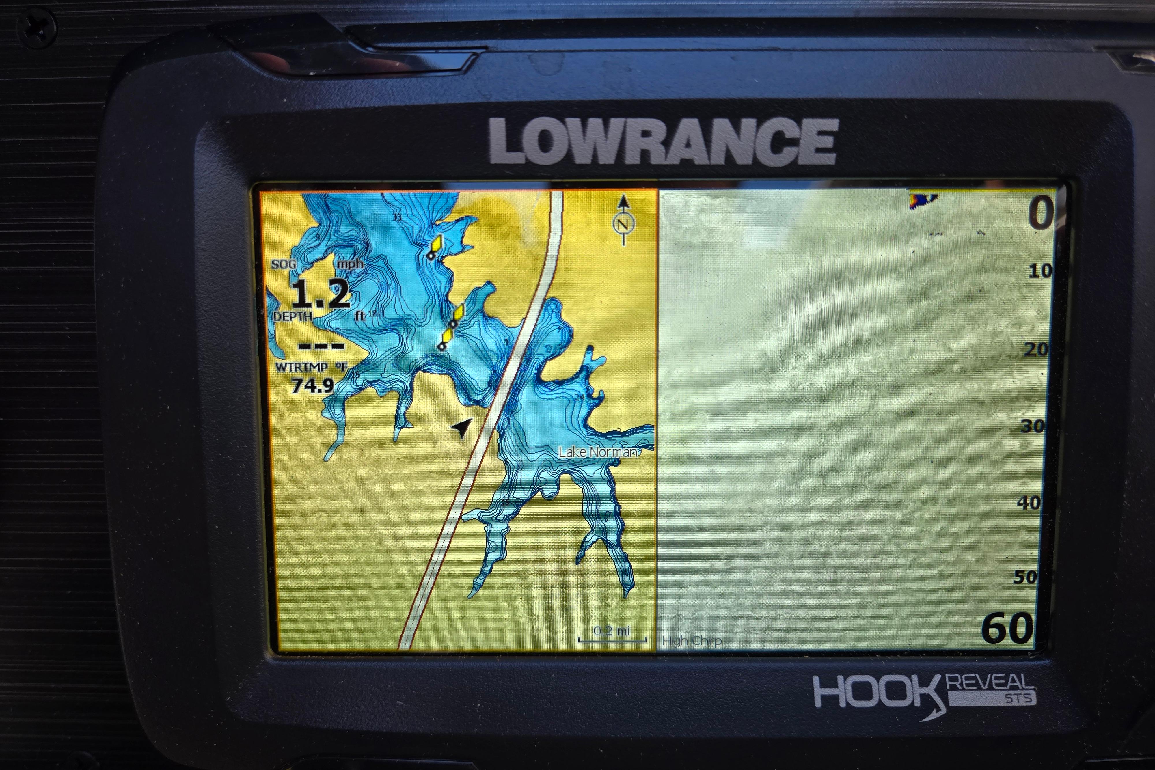 Lowrance Hook Reveal GPS displaying lake map on Godfrey Sweetwater 2486 SB, 2024 model.