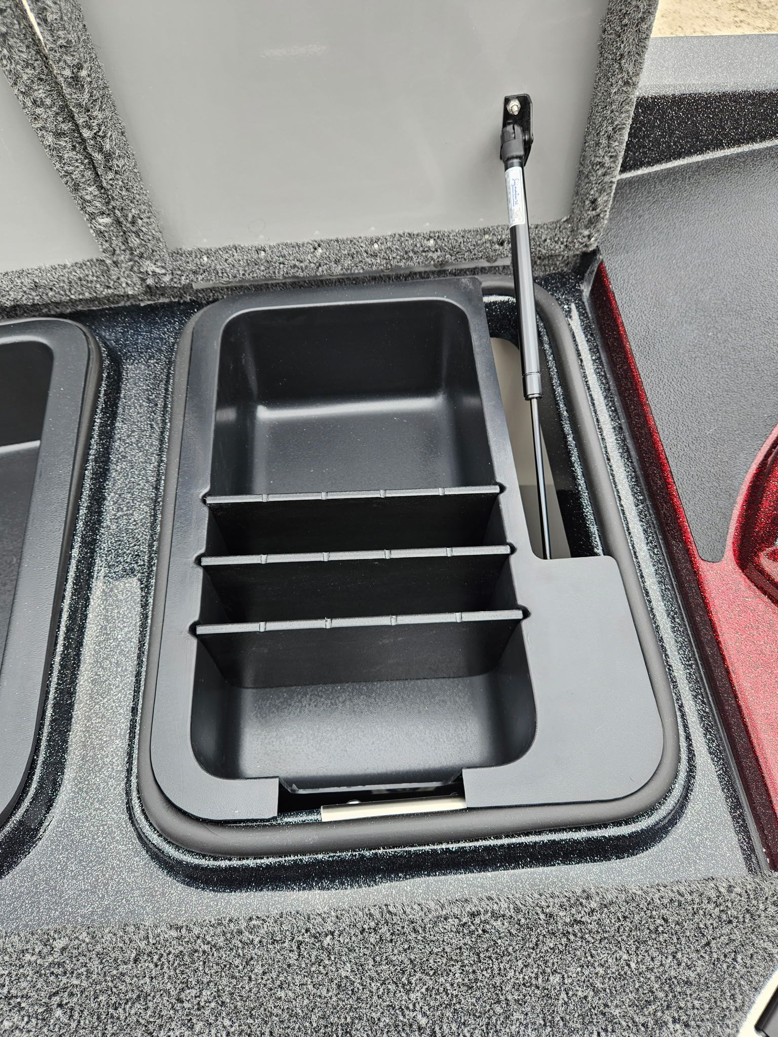 Caymas CX 21 PRO 2027 storage compartment with dividers.