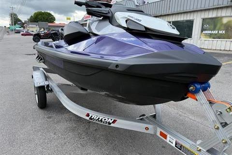 2025 Sea-Doo GTI SE 130 jet ski on a Triton trailer, parked outdoors.