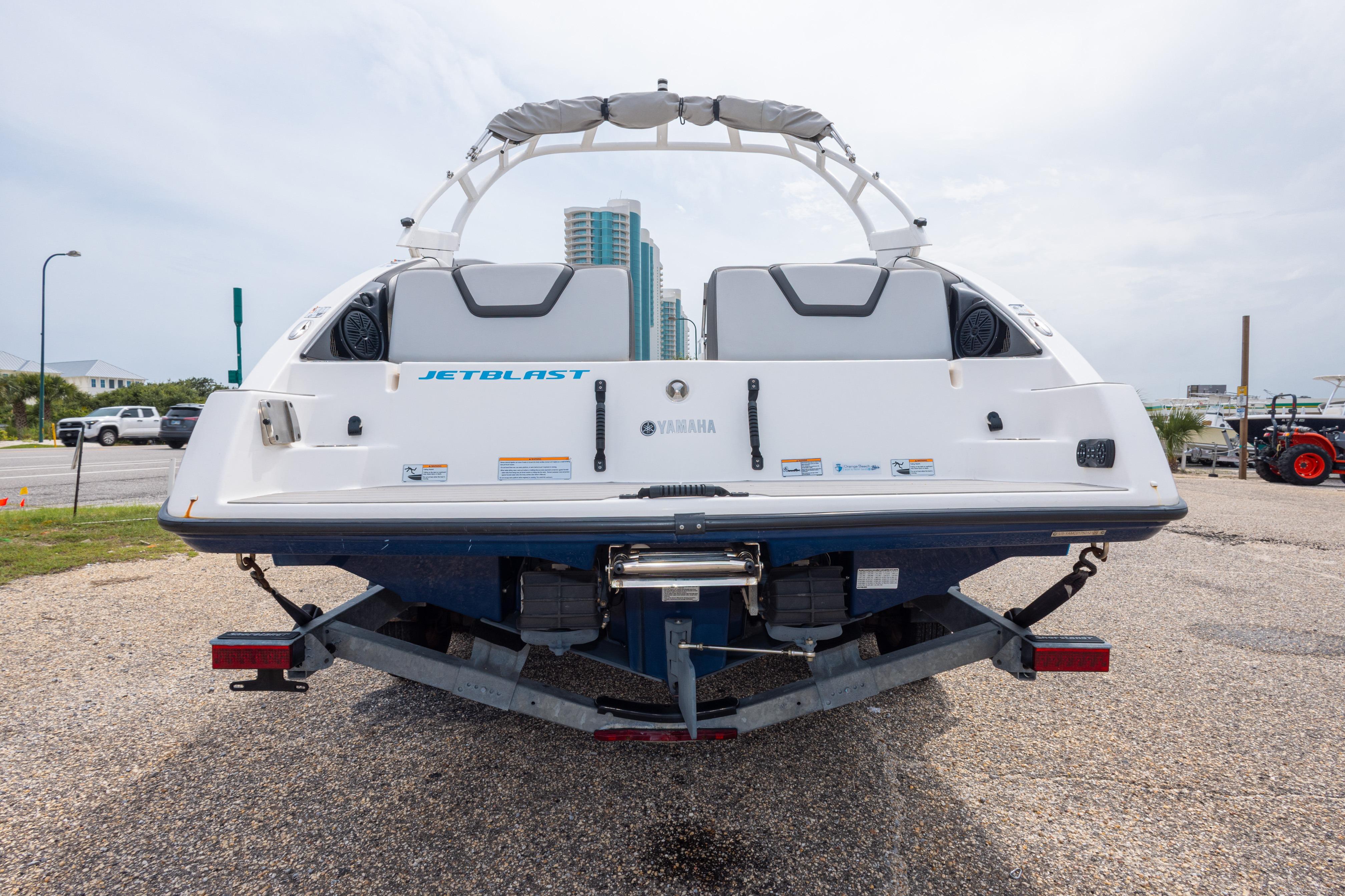 2021 Yamaha Boats AR250 rear view on trailer, showcasing sleek design and features.