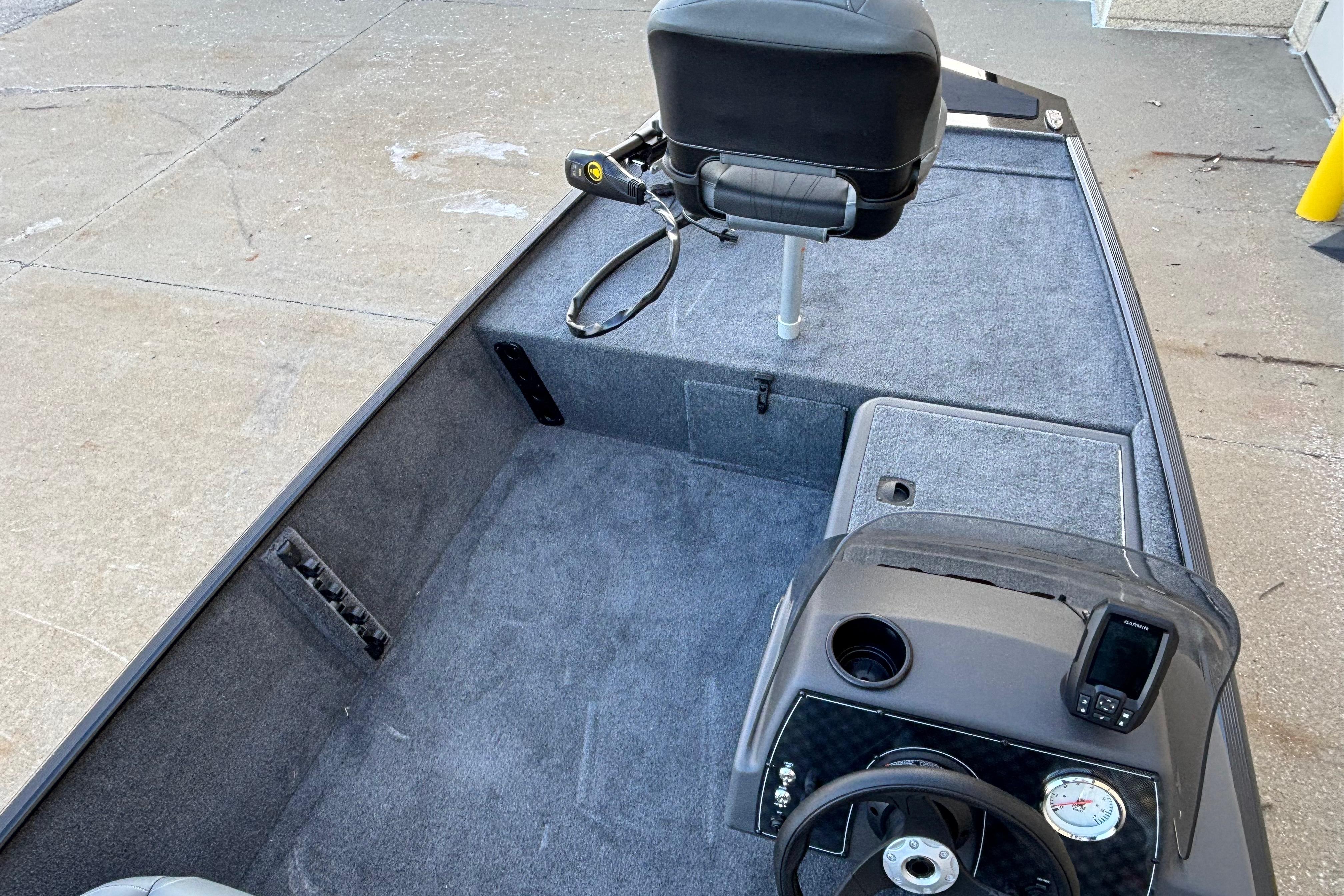 2026 Tracker Bass Tracker Classic XL boat interior with steering console and seating.