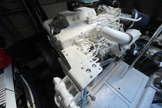 Engine compartment of a 2016 Sea Ray Sundancer 510 yacht, showcasing its powerful machinery.
