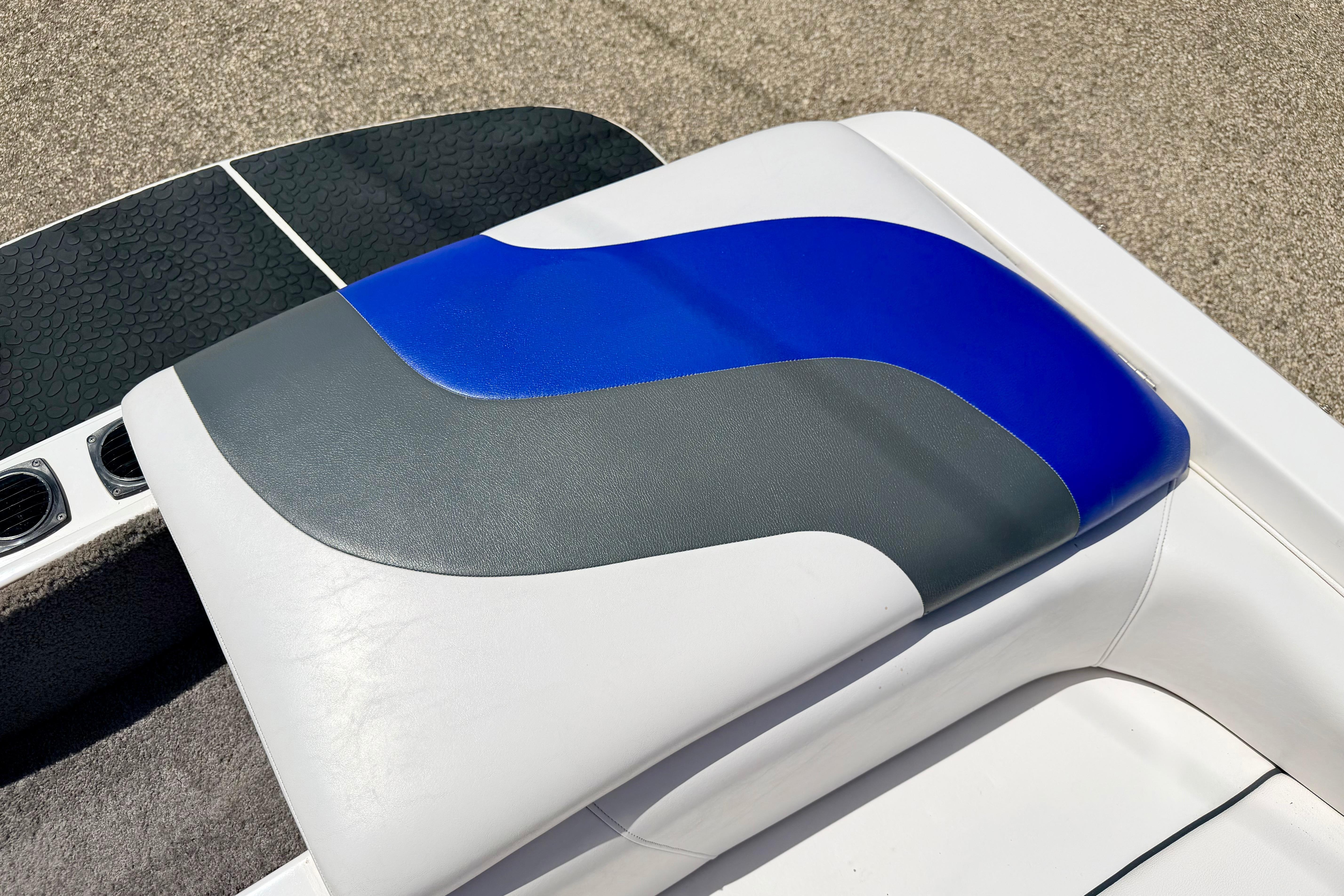 2008 Moomba Outback V boat seat with blue, gray, and white upholstery design.