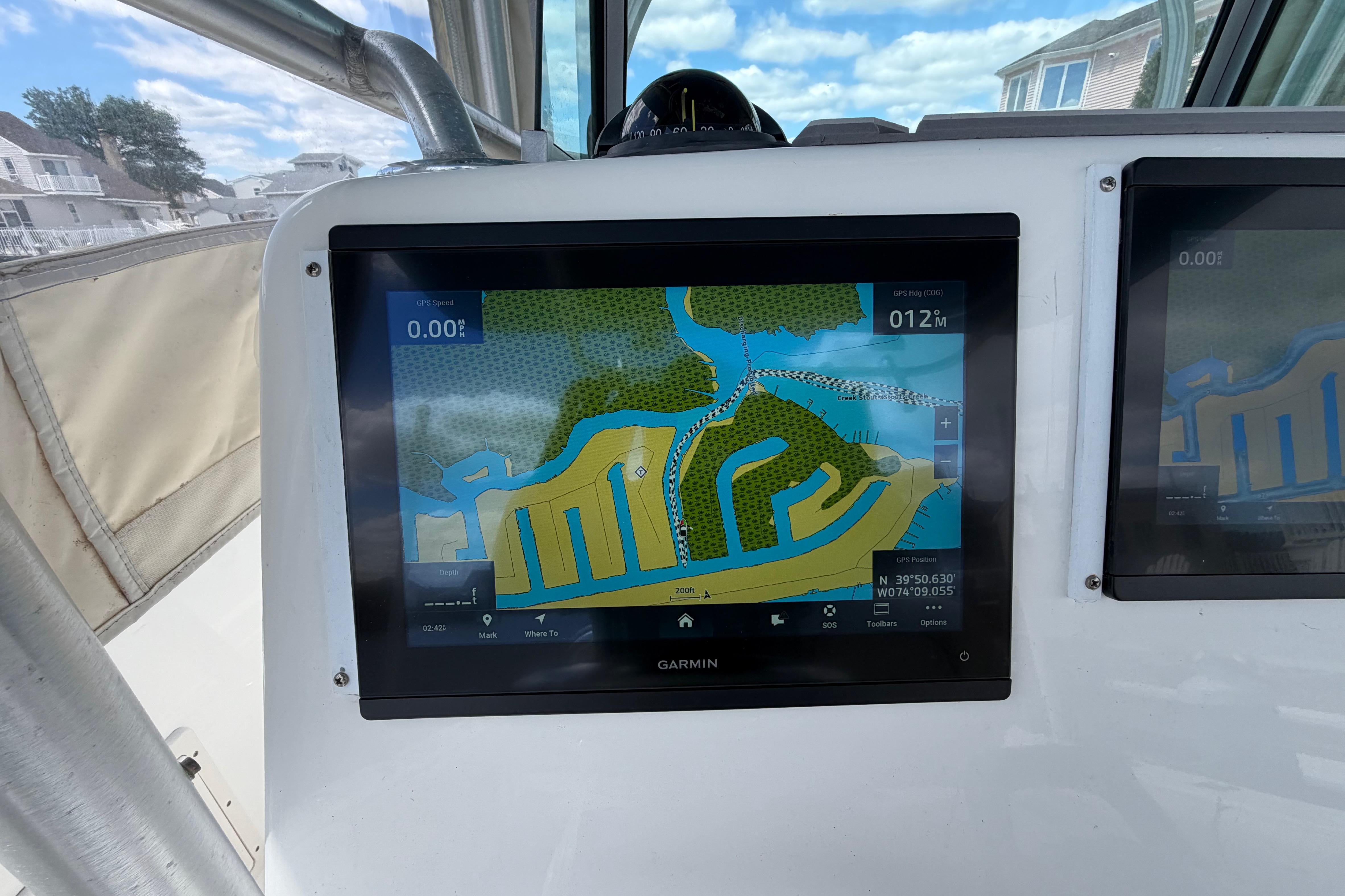Garmin navigation display on 2017 Mako 284 Center Console boat, showing coastal map.