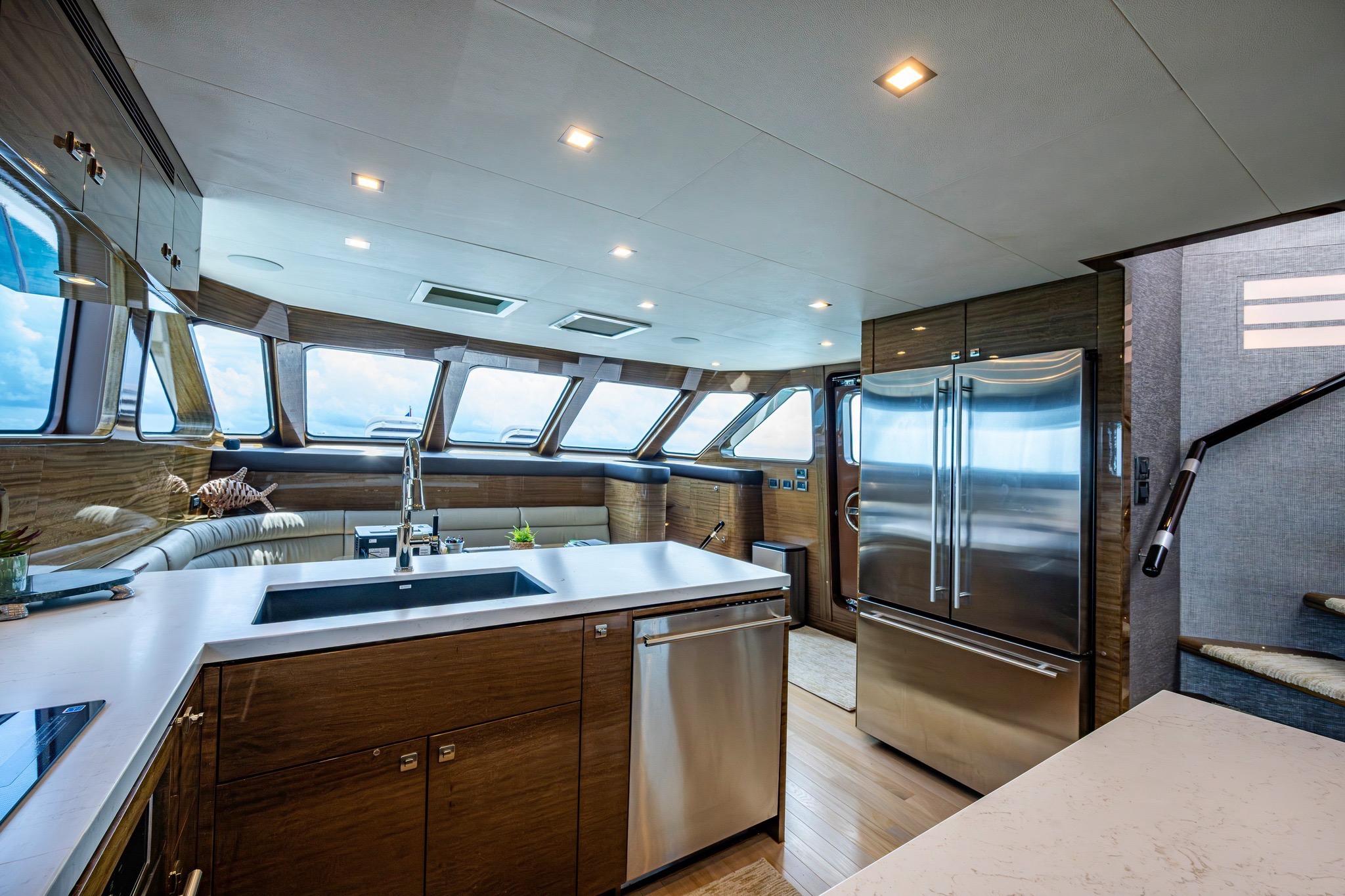 Luxurious interior of 2018 Cheoy Lee Bravo 78 Sport Motor Yacht kitchen area.