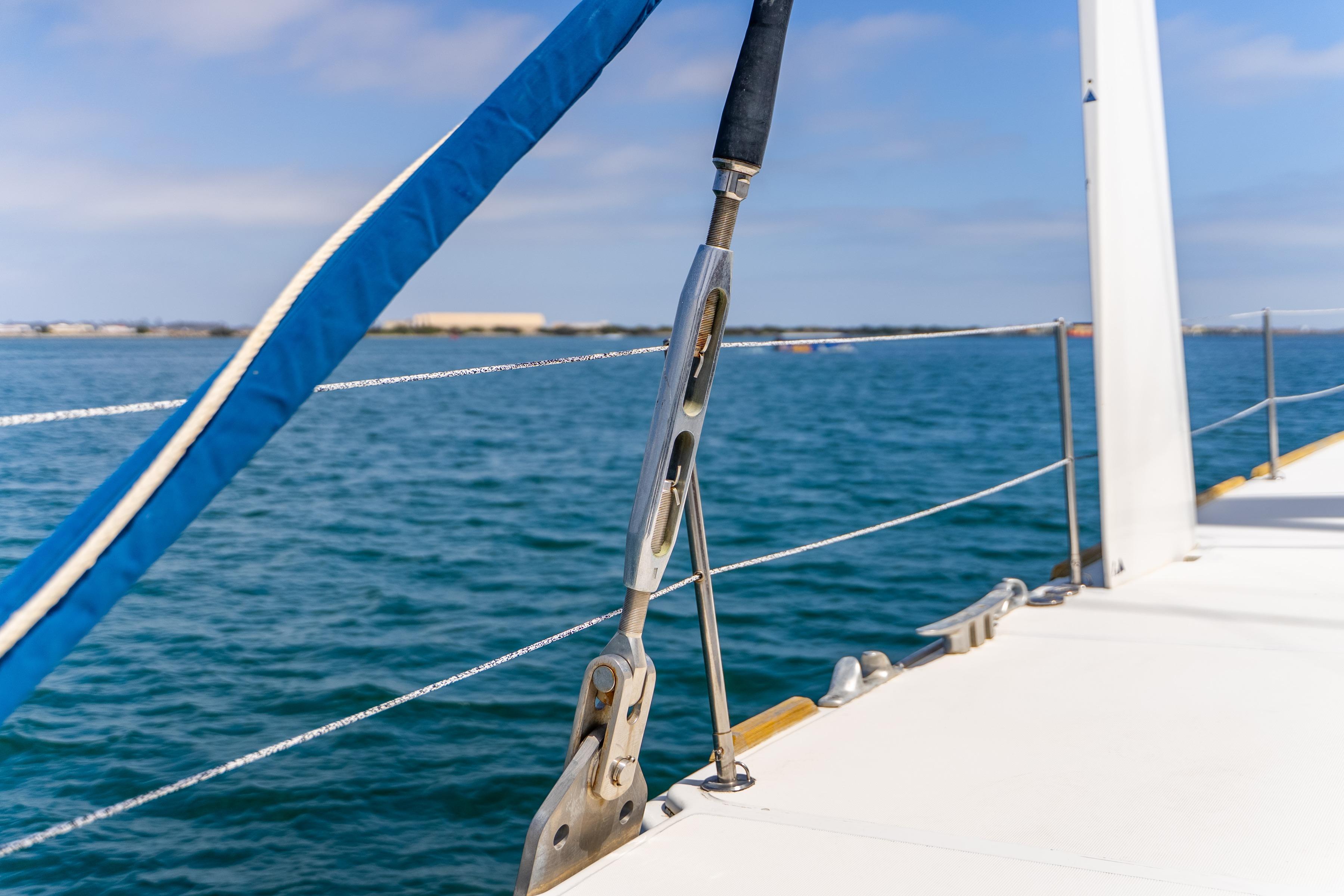 Close-up of Catana 65 sailboat deck, showcasing rigging and ocean view, 2009 model.