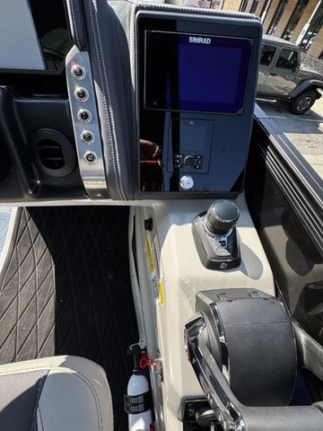 Control panel of 2025 Barletta Boats Lusso L25MAT with Simrad display and joystick.