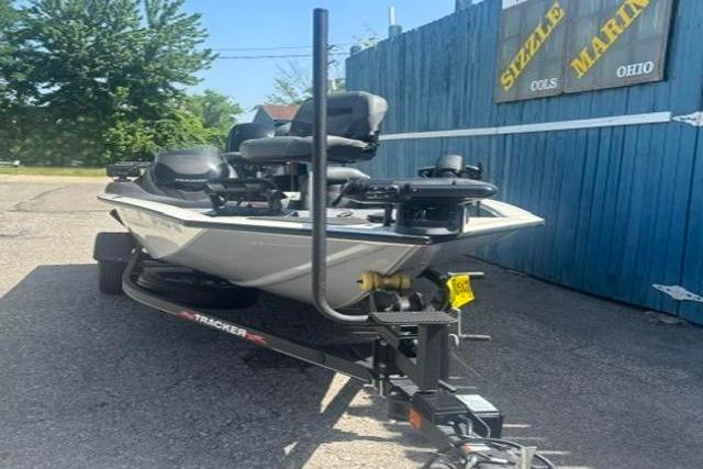 2021 Tracker Pro Team 175 TXW Tournament Edition boat on trailer, parked outdoors.