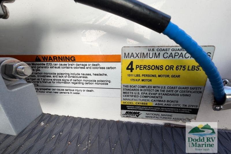 2021 Caymas CX 18 SS capacity label, warning details, and Dodd RV Marine logo.