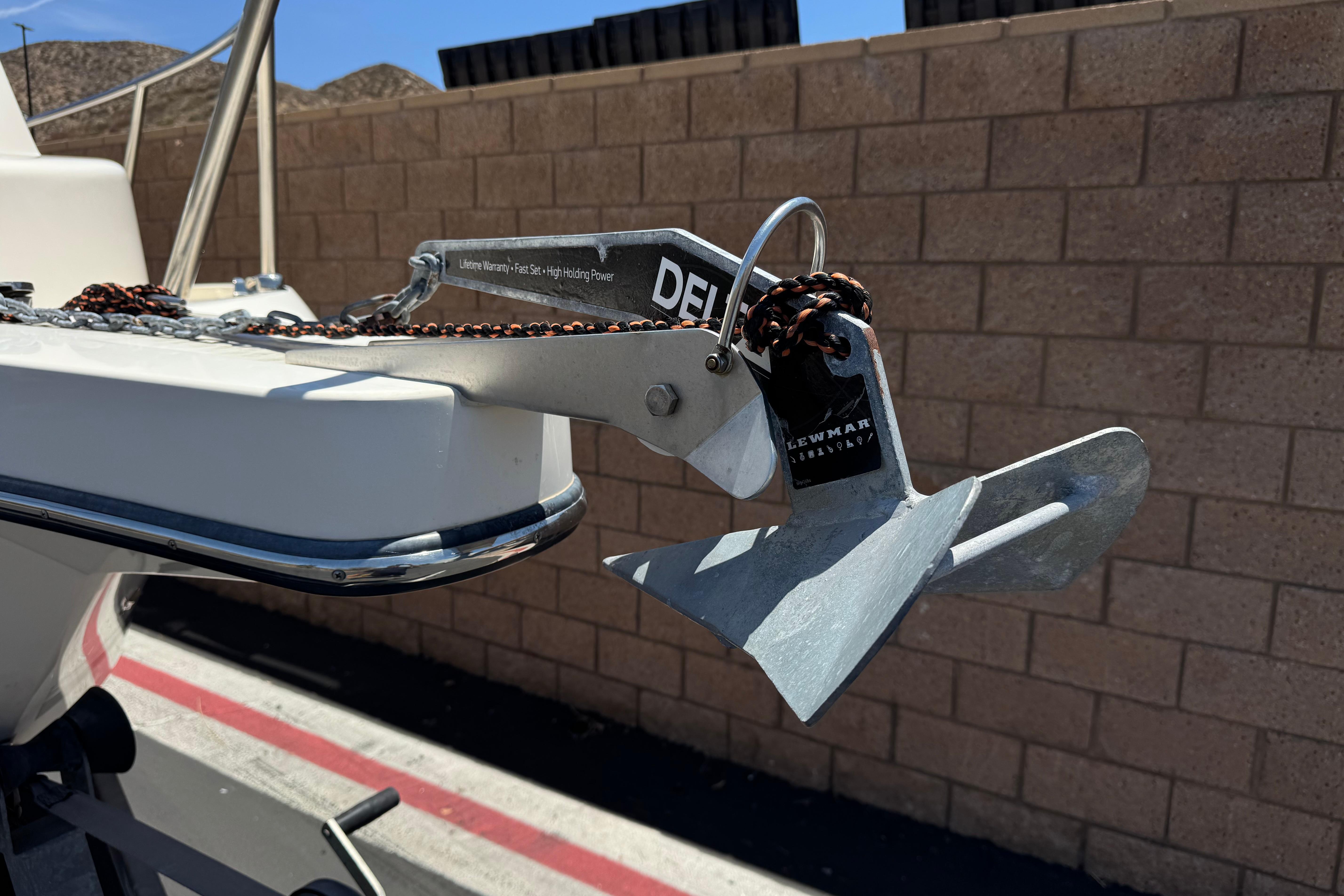 2017 Defiance Admiral 220 EX boat anchor with chain, mounted on a trailer.