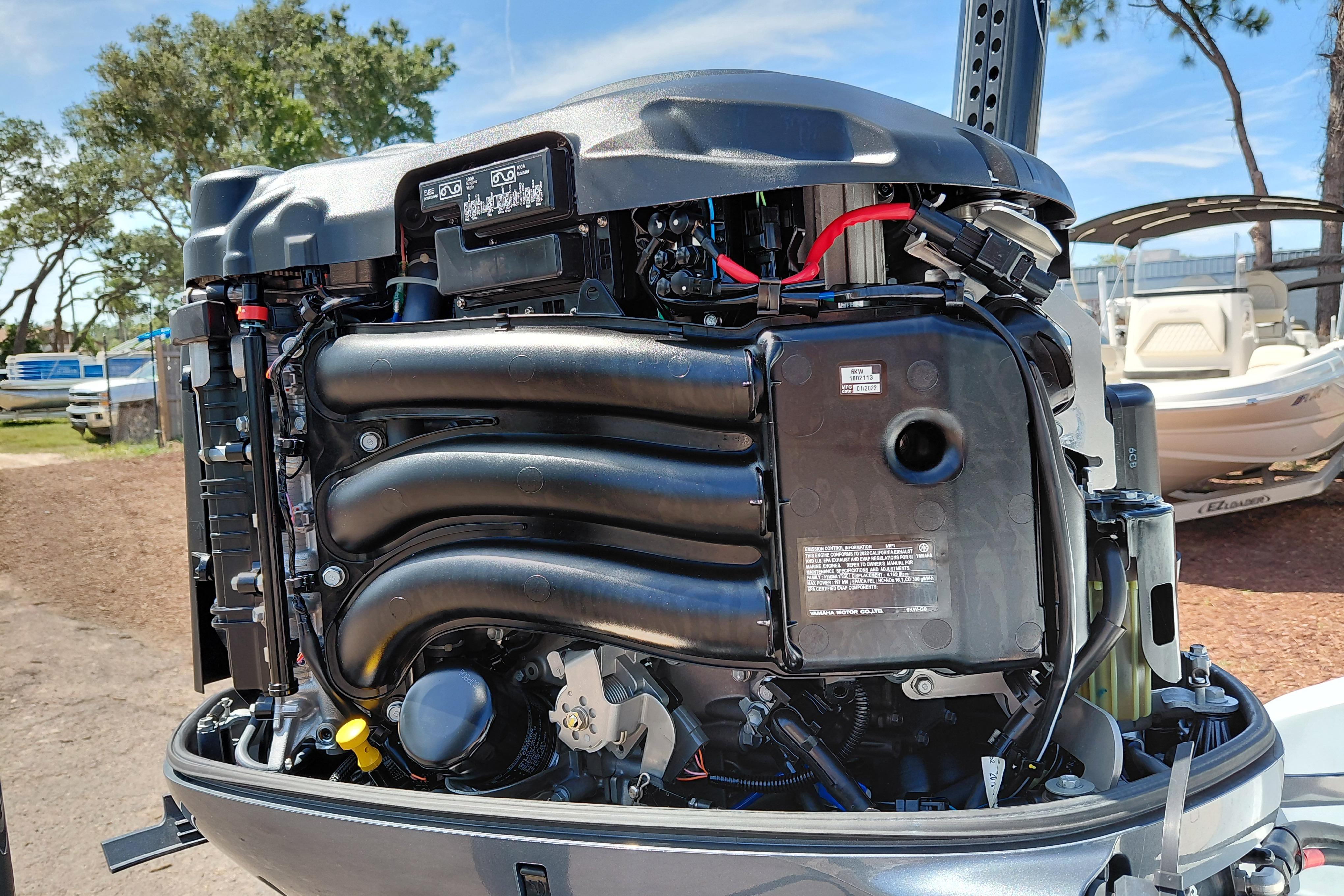 2022 Pathfinder 2300 HPS boat engine, detailed view, outdoors.
