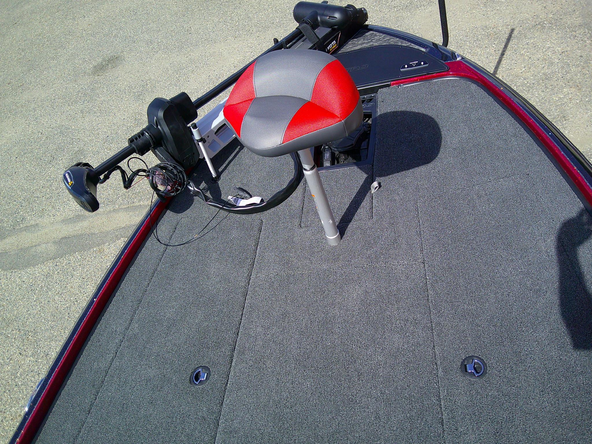2025 Nitro Z20 XL boat deck with red-gray seat and trolling motor.