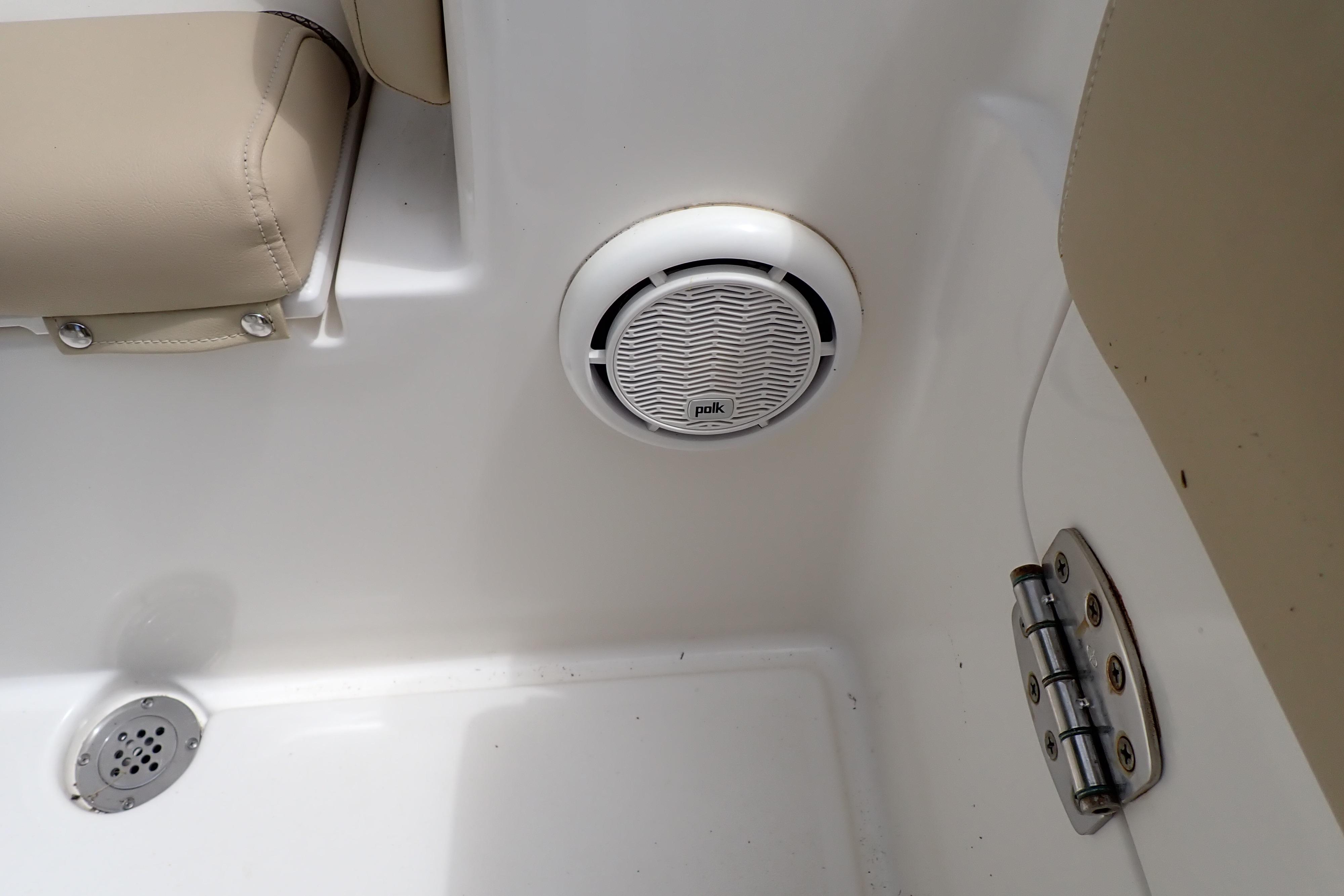 2019 Key West 263 FS boat interior with Polk speaker and beige seating.
