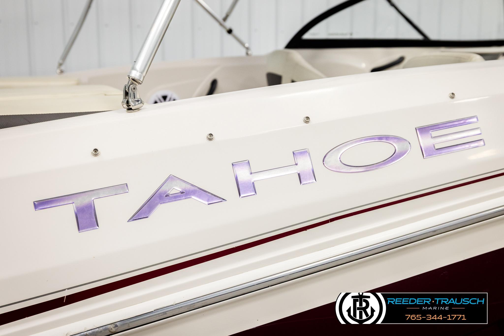 2016 Tahoe 450 TS boat with logo, featuring sleek design and Reeder-Trausch Marine branding.
