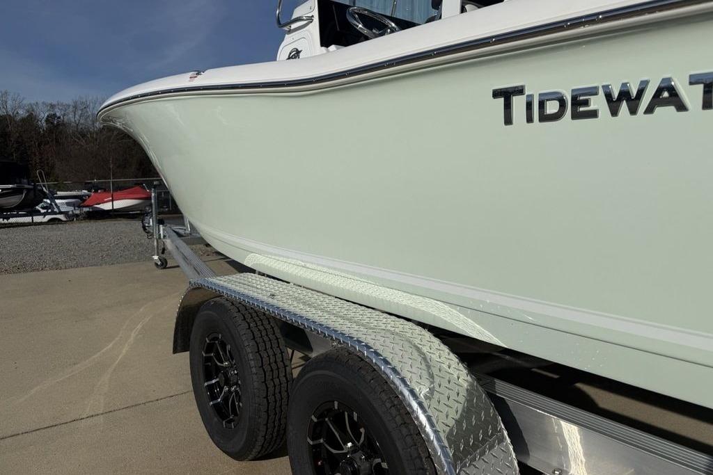 2026 Tidewater 198 CC Adventure boat on trailer, side view with logo visible.