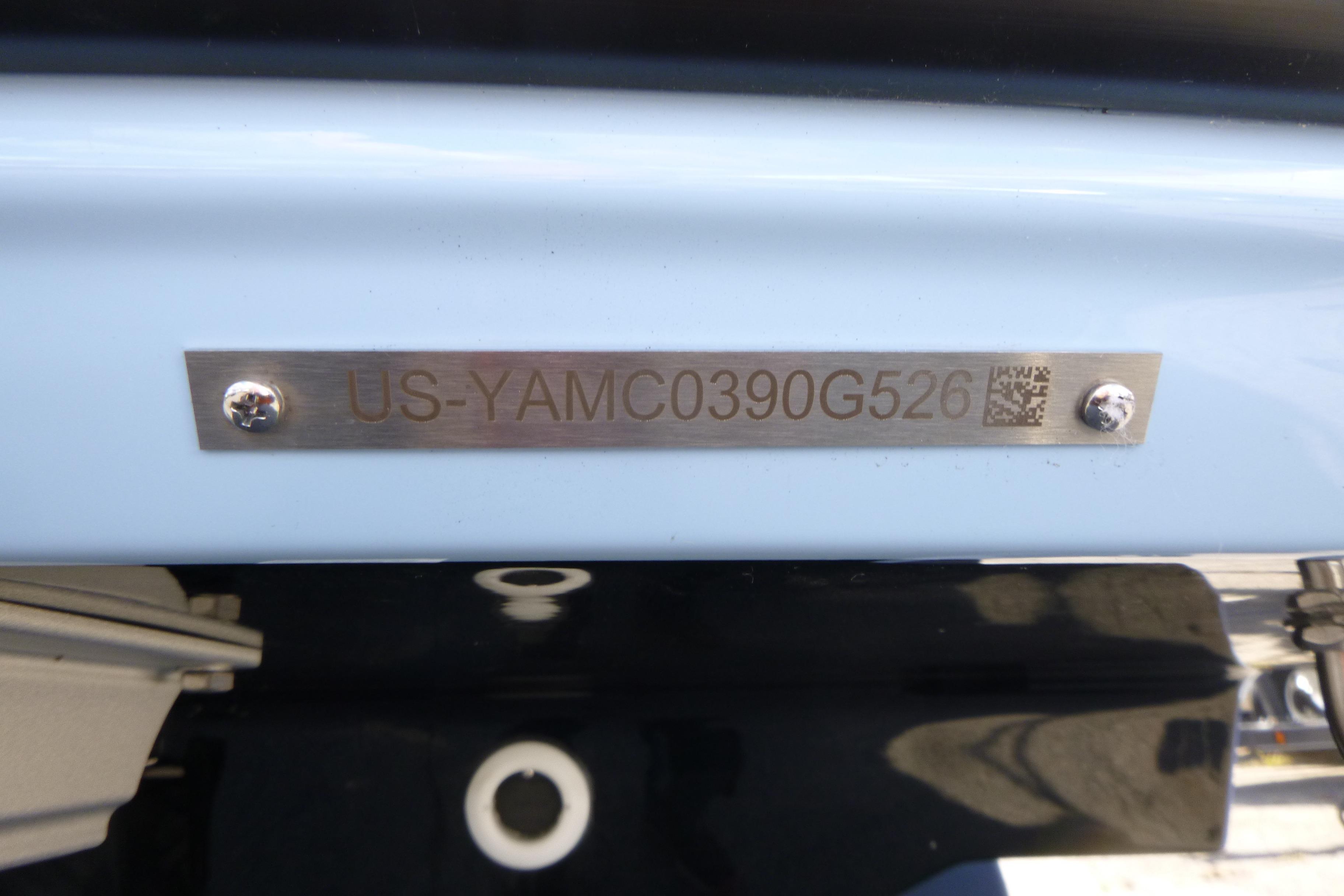 Hull identification number on 2026 Yamaha Boats 252SD, featuring metal plate with screws.