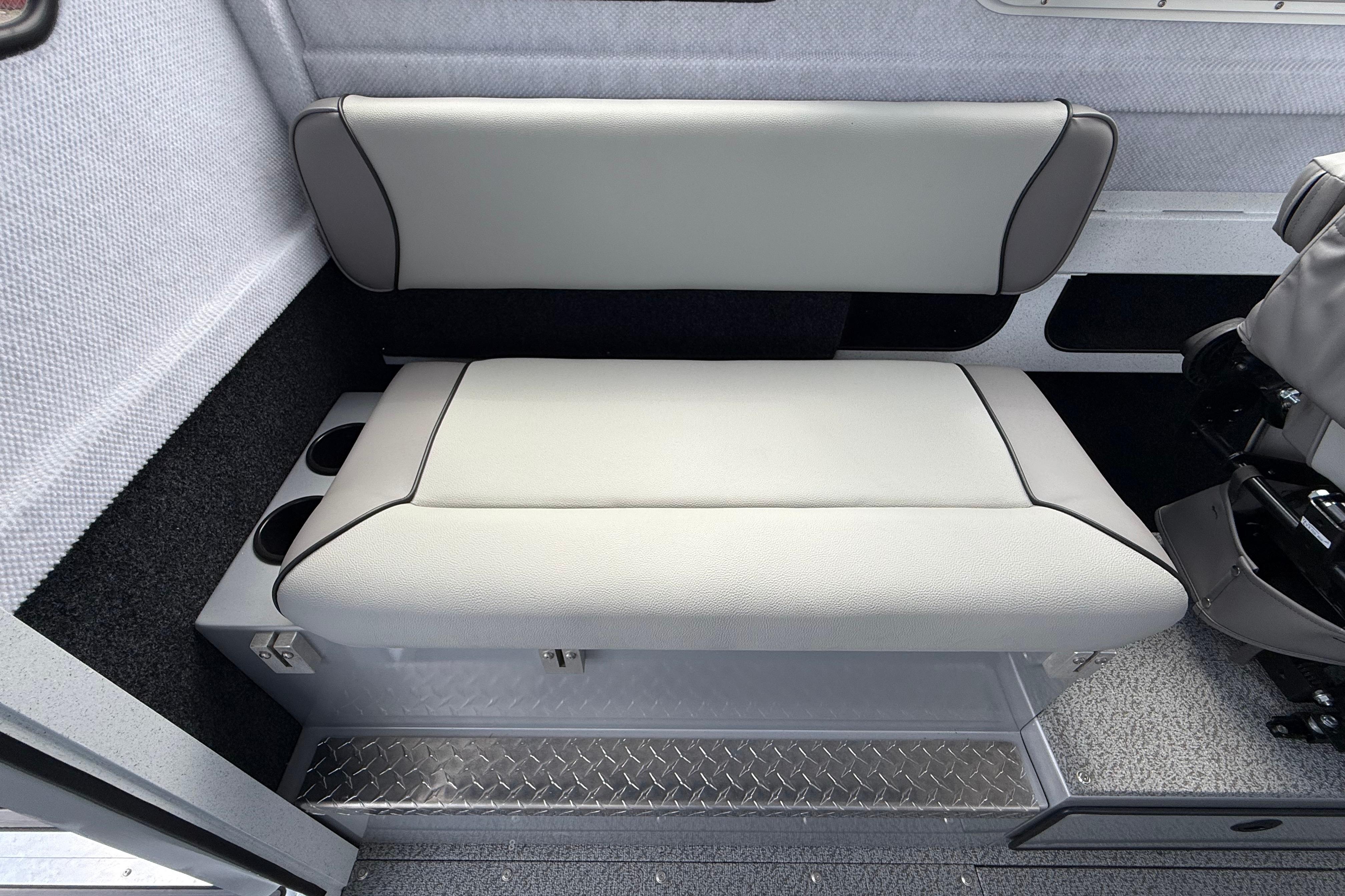 Interior seating of 2026 KingFisher 2825 Coastal Express boat with cup holders.