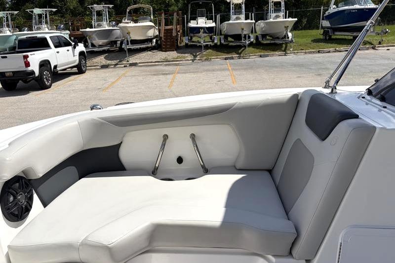 2026 Hurricane SunDeck Sport 2050 OB boat interior with cushioned seating.