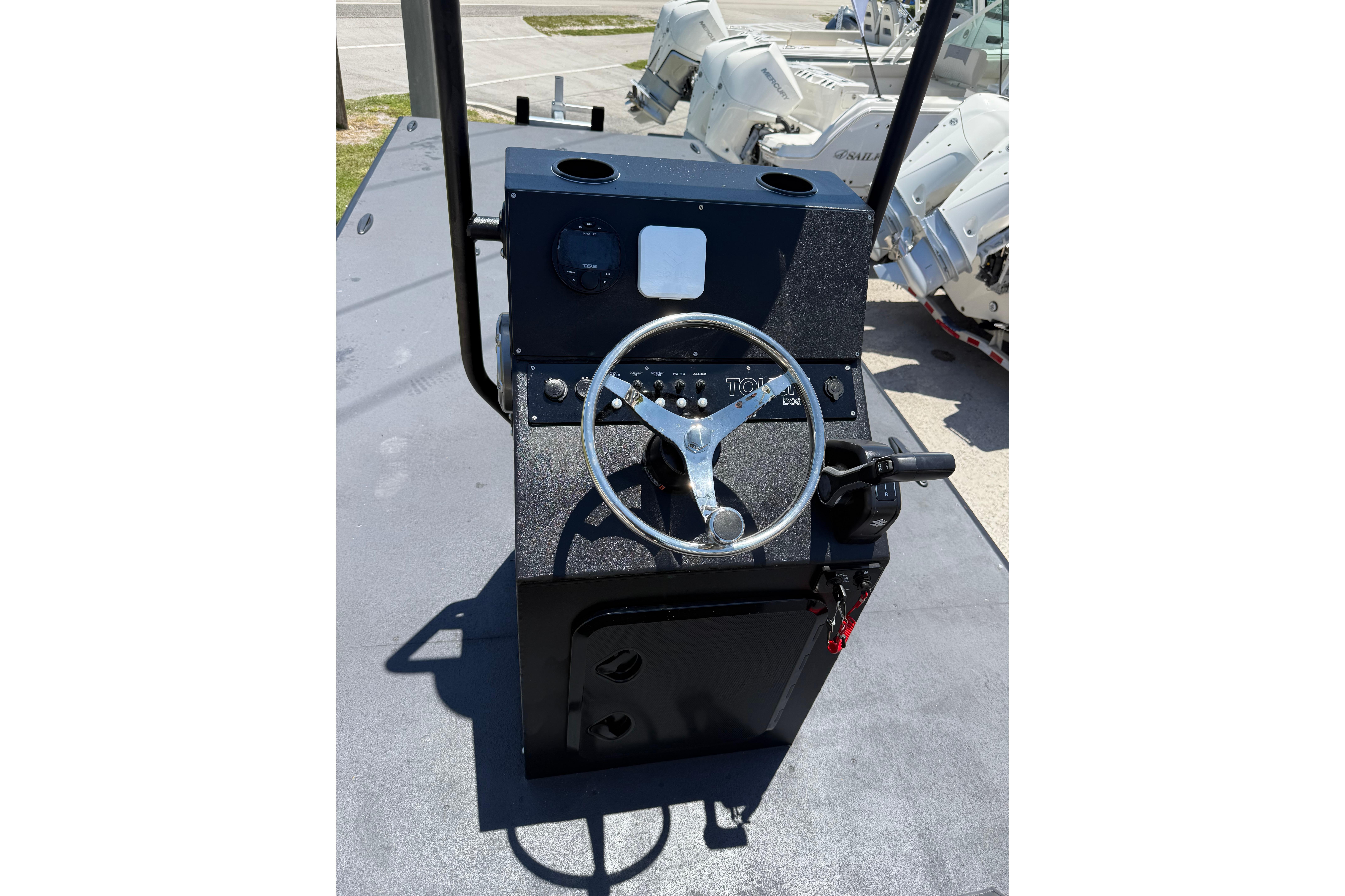 Steering console of a 2026 Tough 20 boat, featuring a sleek design and modern controls.