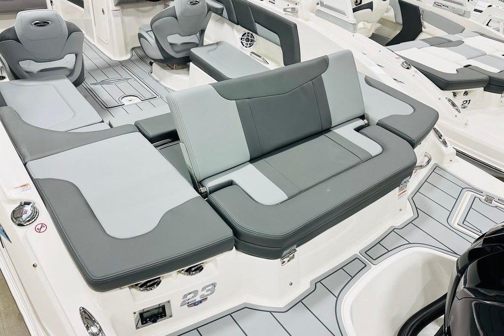 2025 Chaparral 23 SSi OB boat interior with gray seating and modern design.