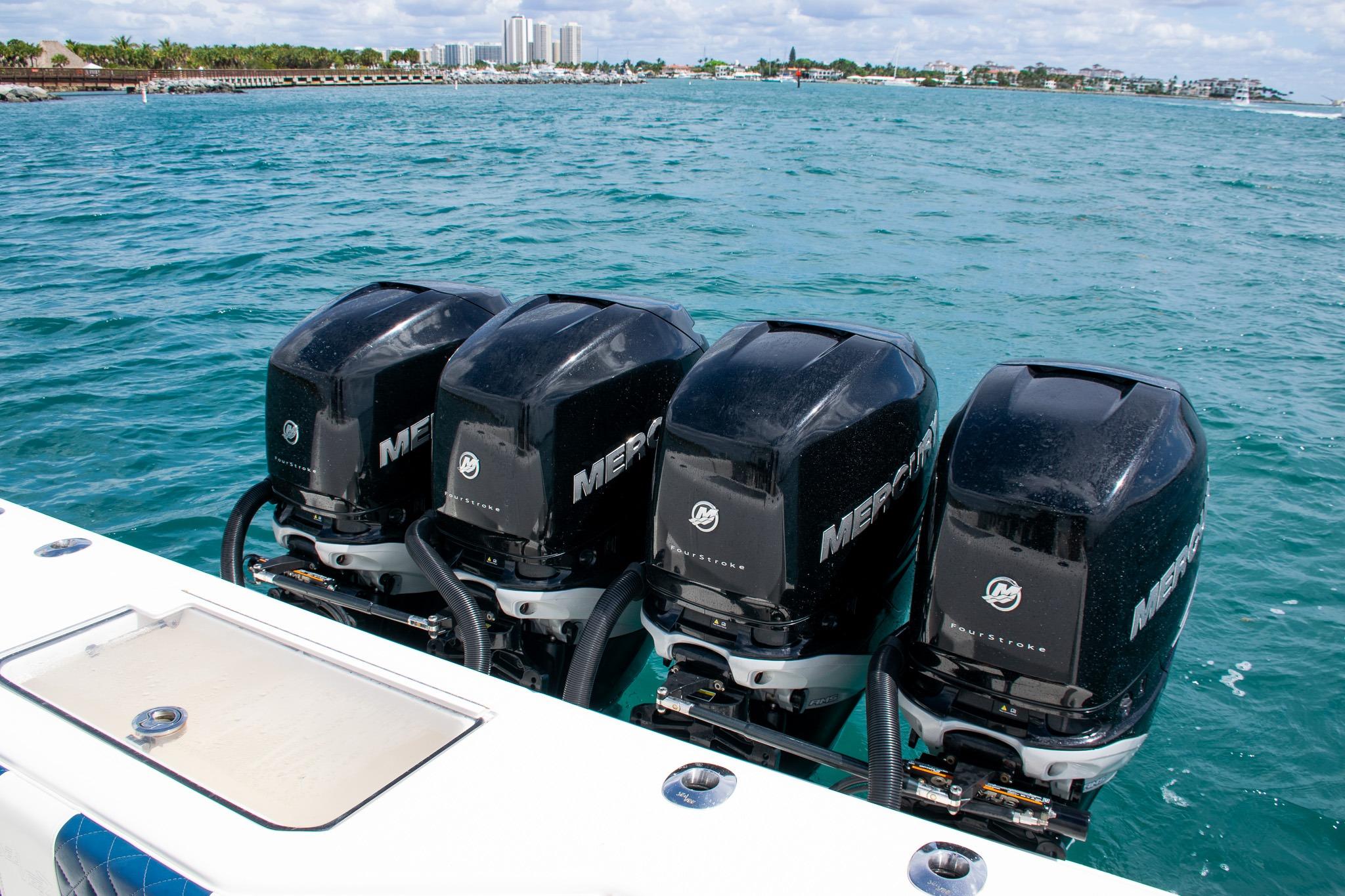 Four Mercury outboard engines on a 2022 SeaVee 390Z boat in open water.