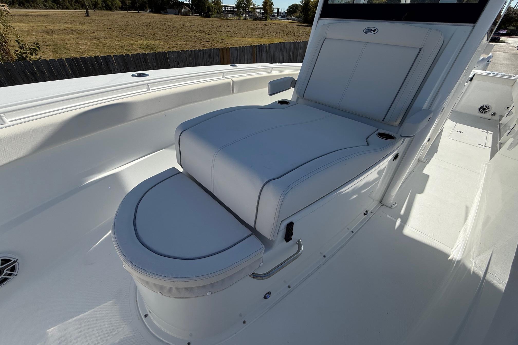 2026 Sea Hunt Gamefish 30 Coffin Box boat interior with cushioned seating.