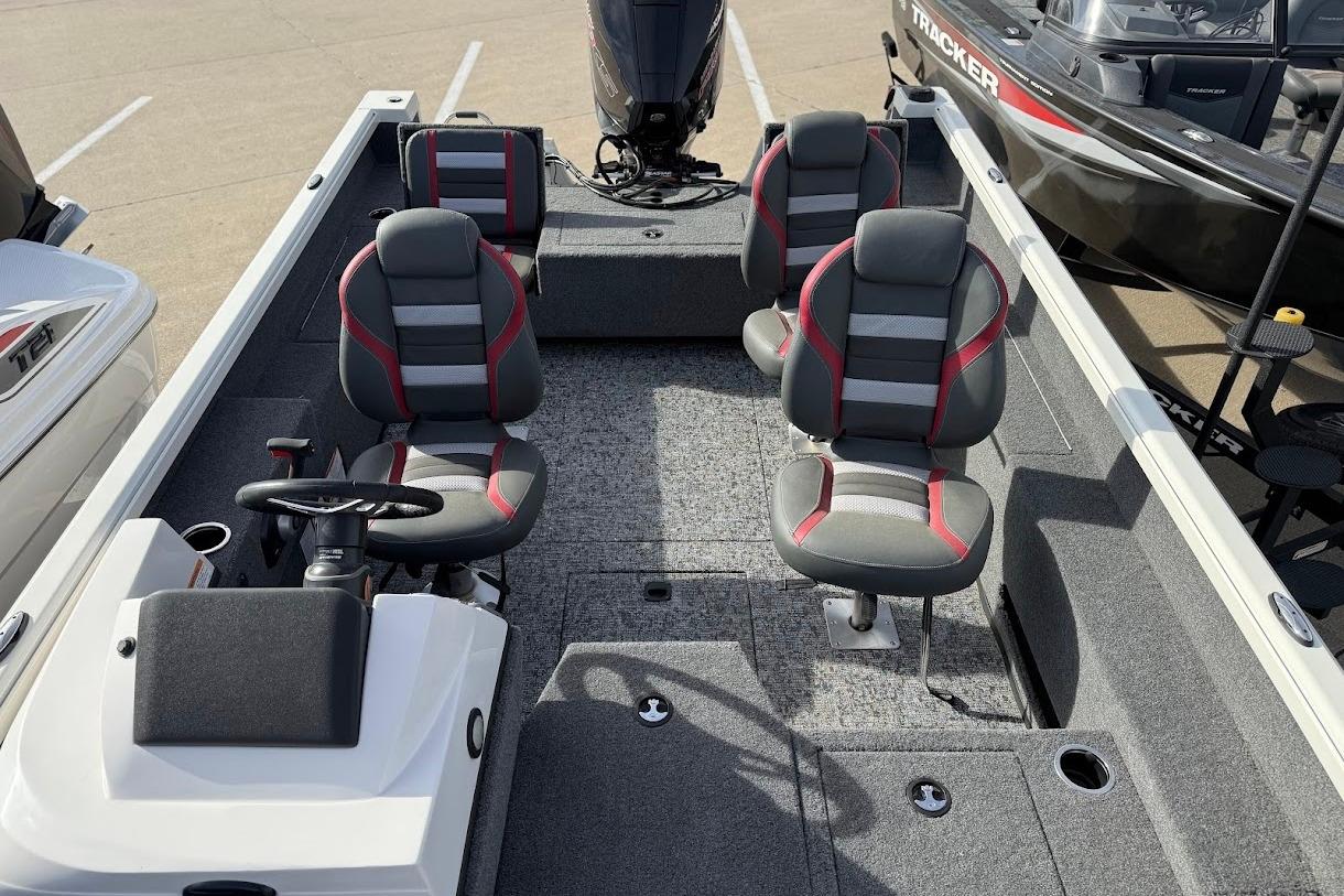 2026 Ranger VS1882SC Reata boat interior with four seats and steering console.
