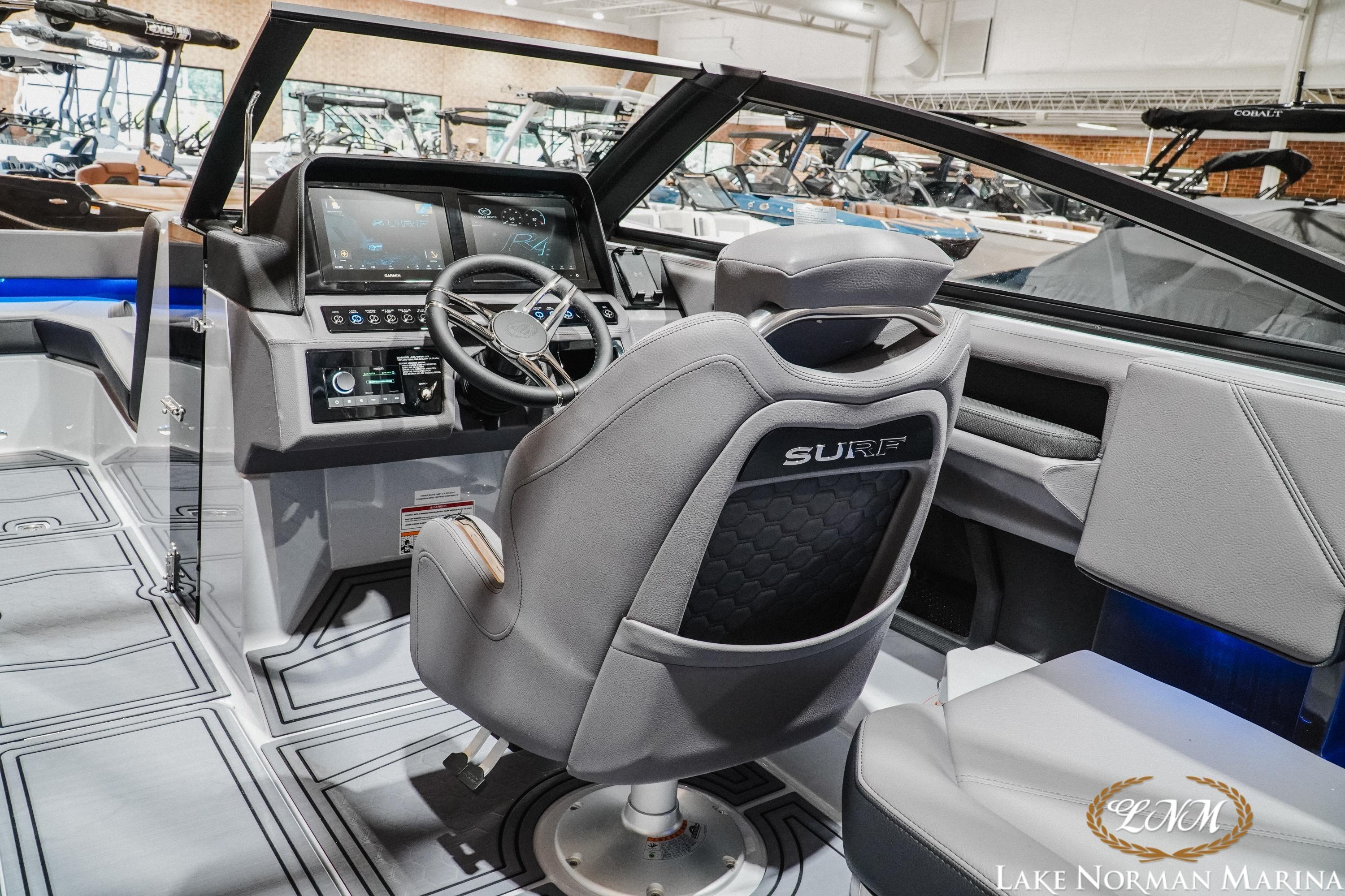 2026 Cobalt R4 Surf boat interior with modern dashboard and steering wheel at Lake Norman Marina.