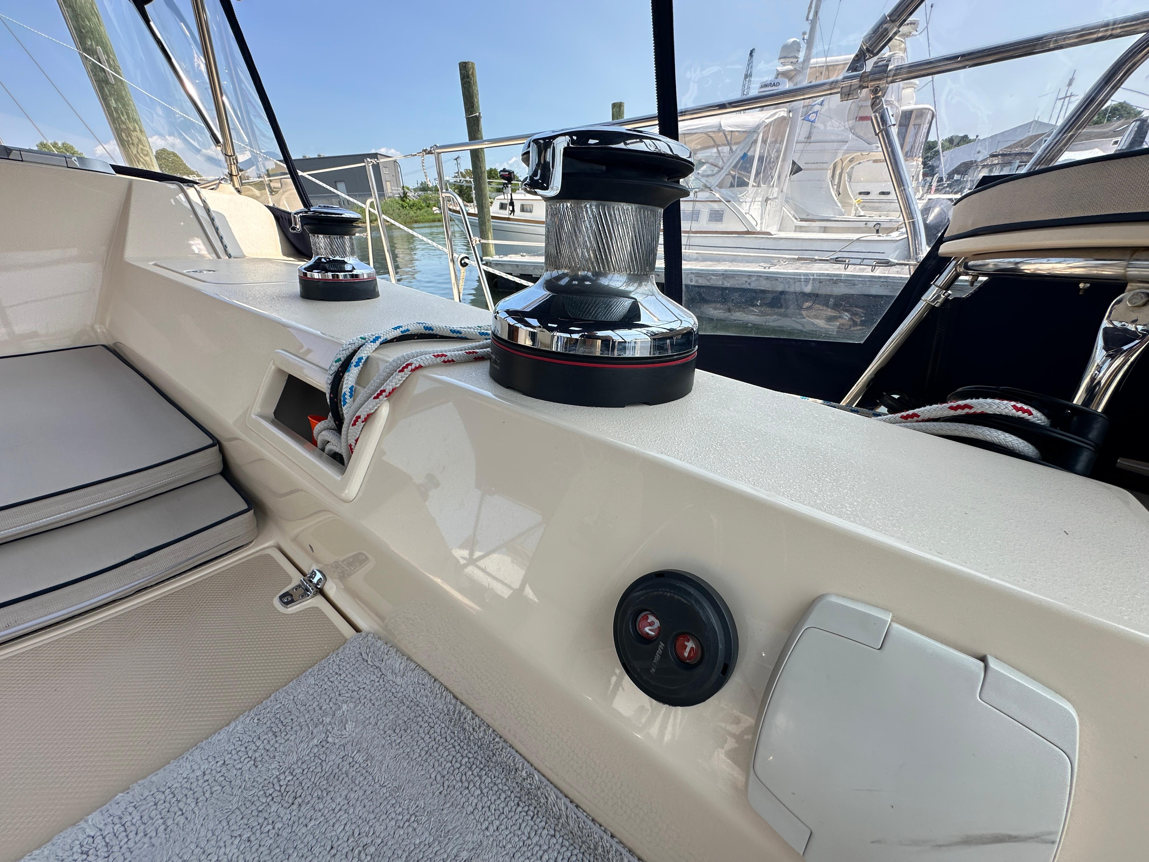 Cockpit view of 2021 Island Packet 439 sailboat with winch and ropes.