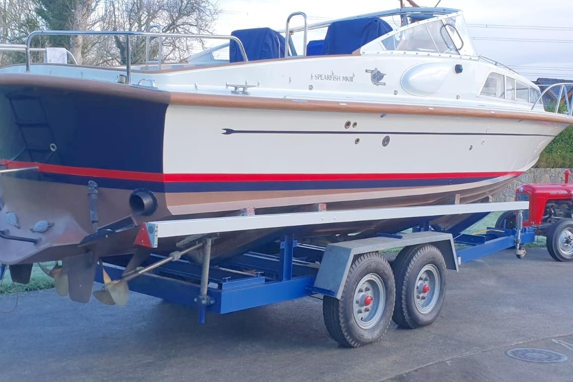 Fairey Spearfish MKIII boat from 1989 on a trailer, side view.