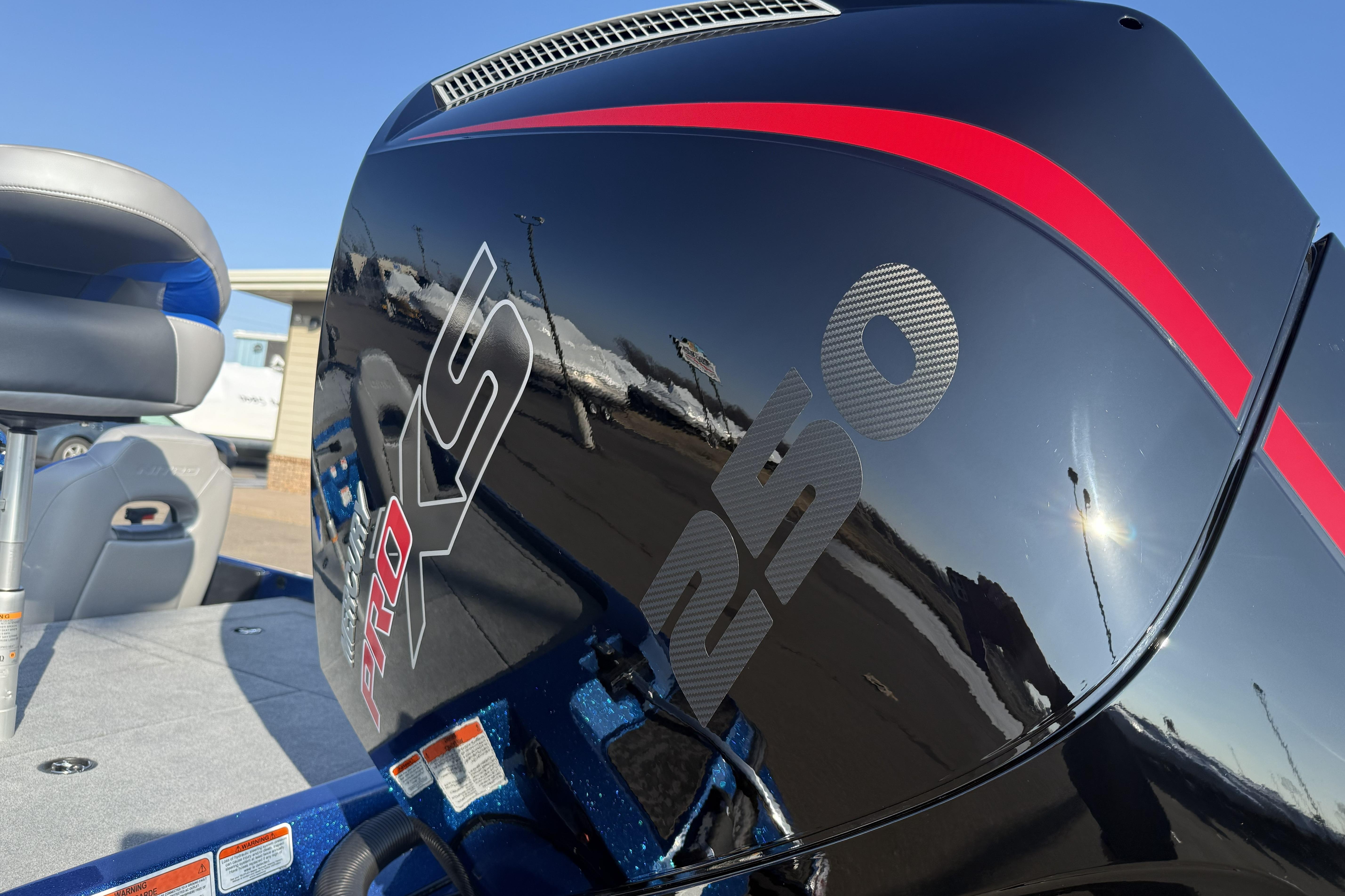 2026 Nitro Z21 XL Pro boat engine with sleek design and vibrant red accents.