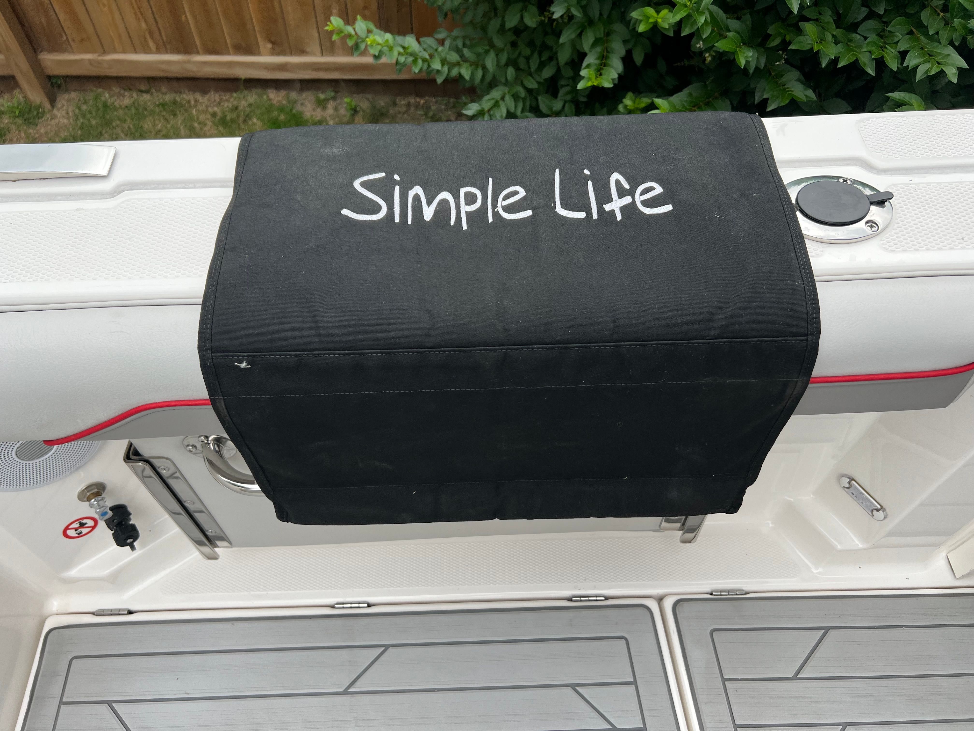 Solara S 250DC boat with 'Simple Life' cover, 2023 model.