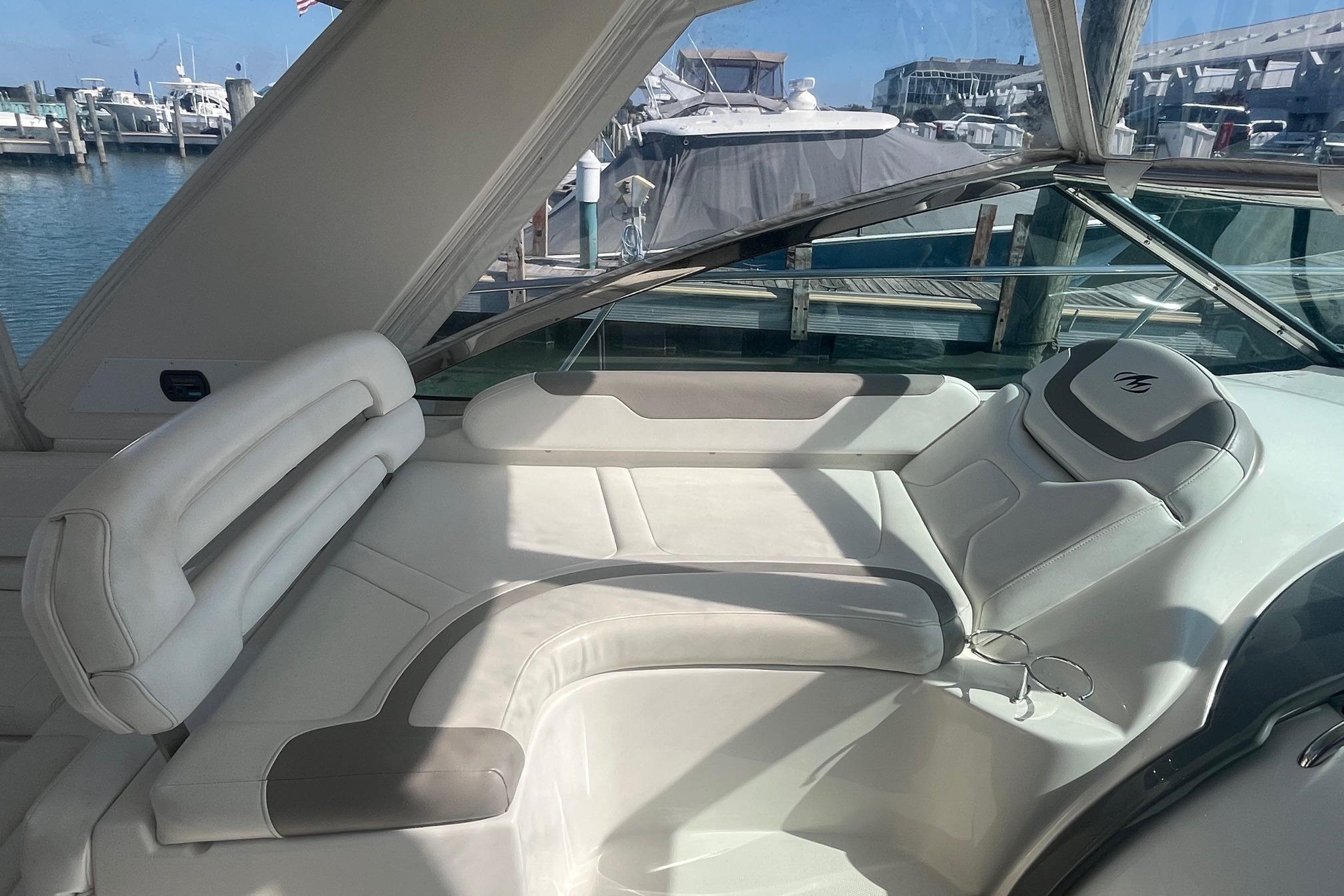 Luxurious interior of 2010 Monterey 400 Sport Yacht at marina dock.