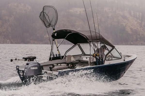 Manufacturer Provided Image: 2026 KingFisher 16 Falcon boat on water, equipped with Yamaha motor and fishing gear.