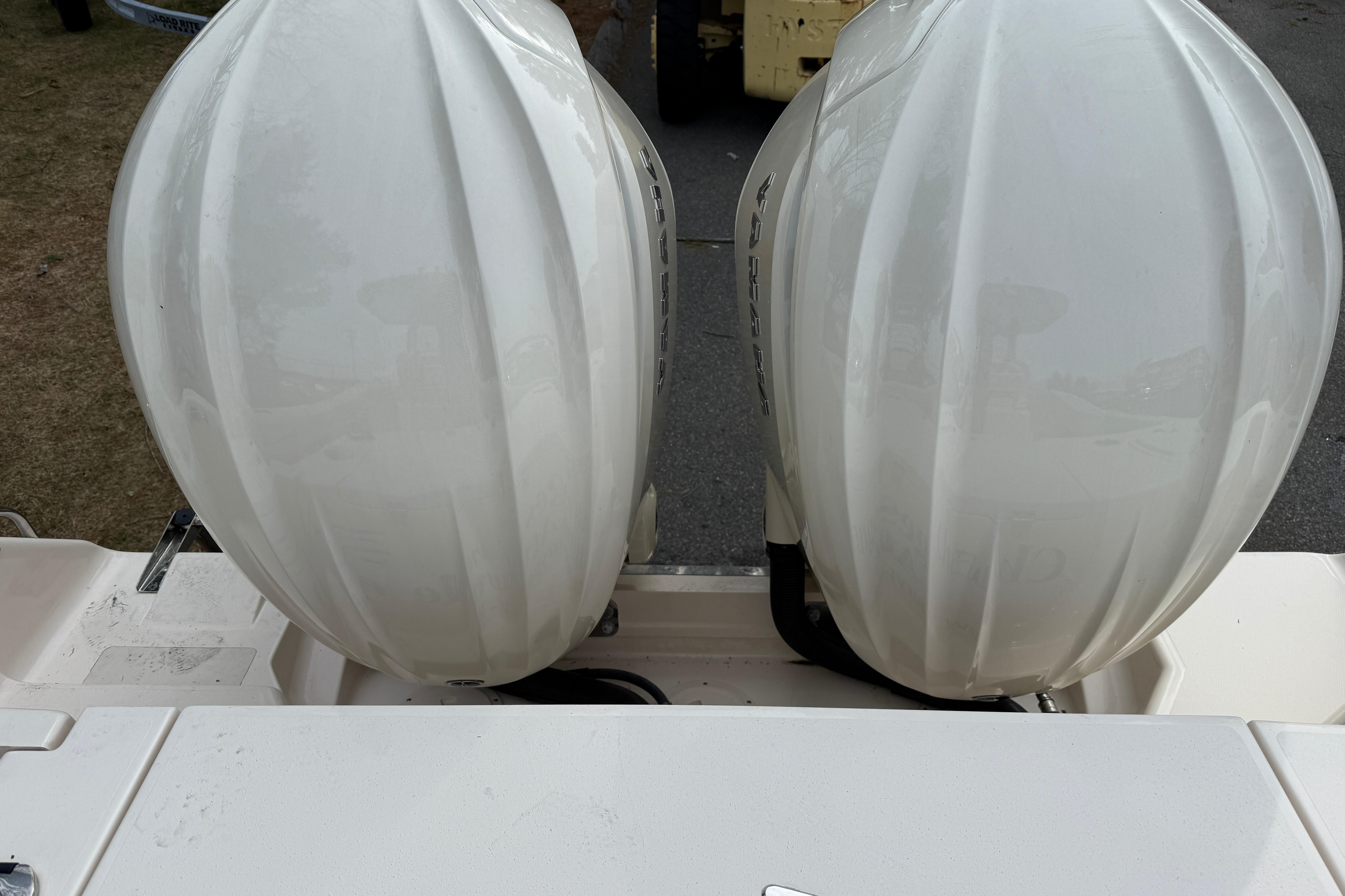 Twin outboard engines on a 2024 Grady-White Canyon 271 boat.