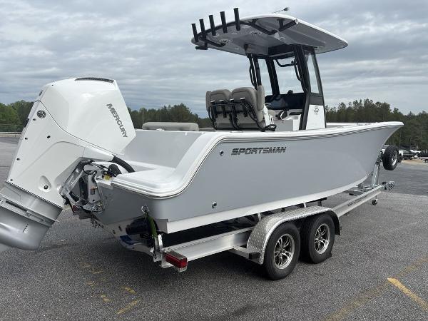 2025 Sportsman Open 232 boat on trailer, featuring a Mercury outboard motor.