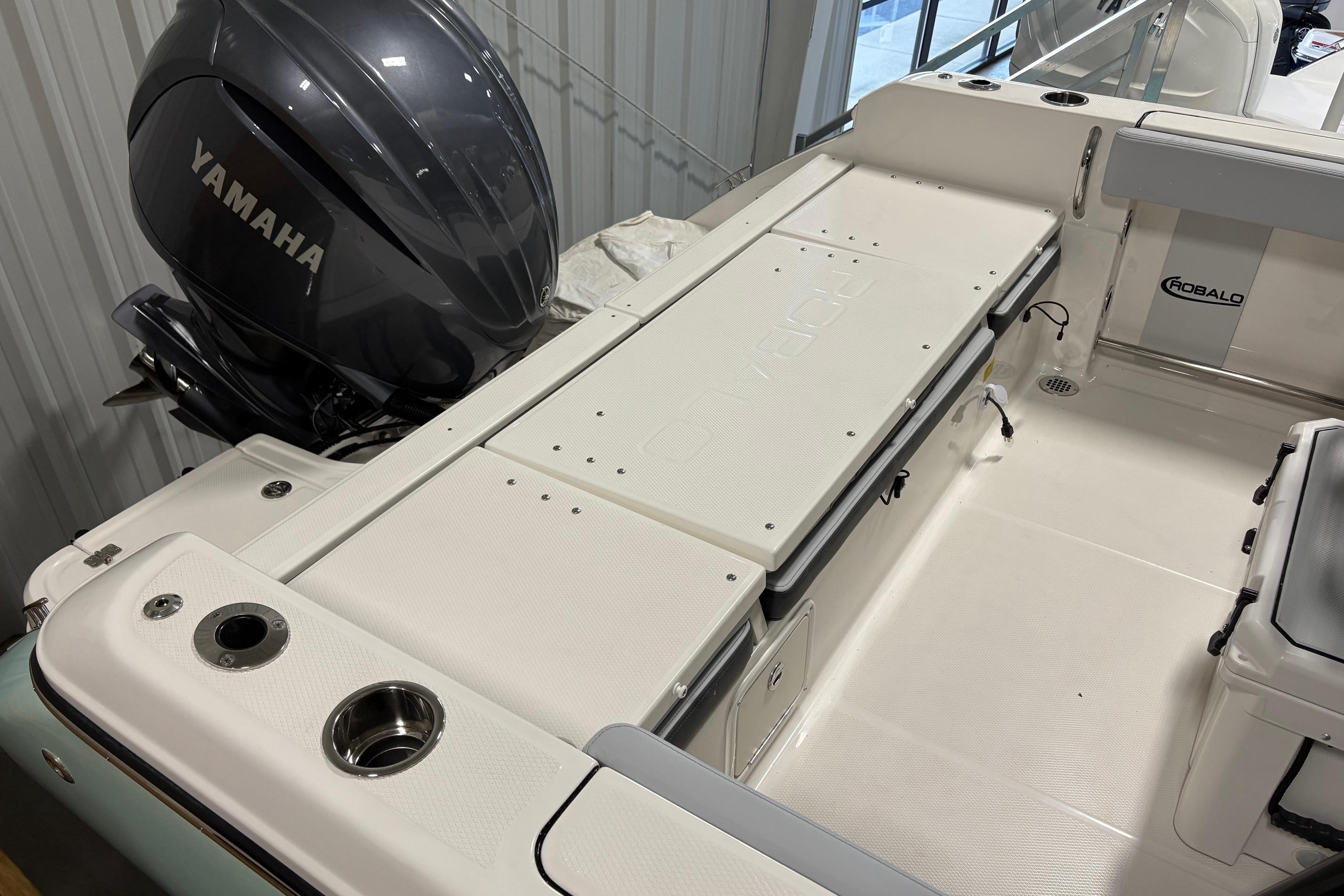 2025 Robalo R232 Explorer boat with Yamaha engine, featuring spacious deck and storage.