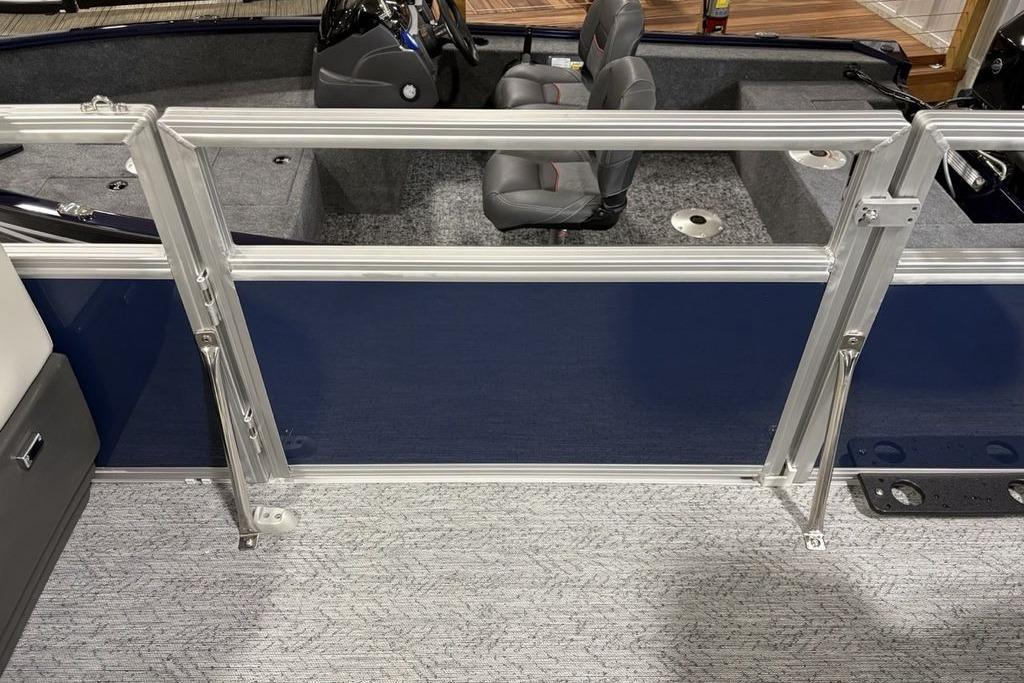 2026 Sun Tracker Bass Buggy 18 DLX interior with seating and railing.