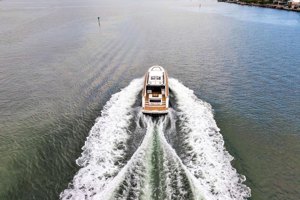 Aerial view of 2012 Fairline Targa 58 yacht cruising on open water.