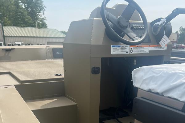 2025 G3 Gator Tough 18 CCJ boat interior with steering console and seating.