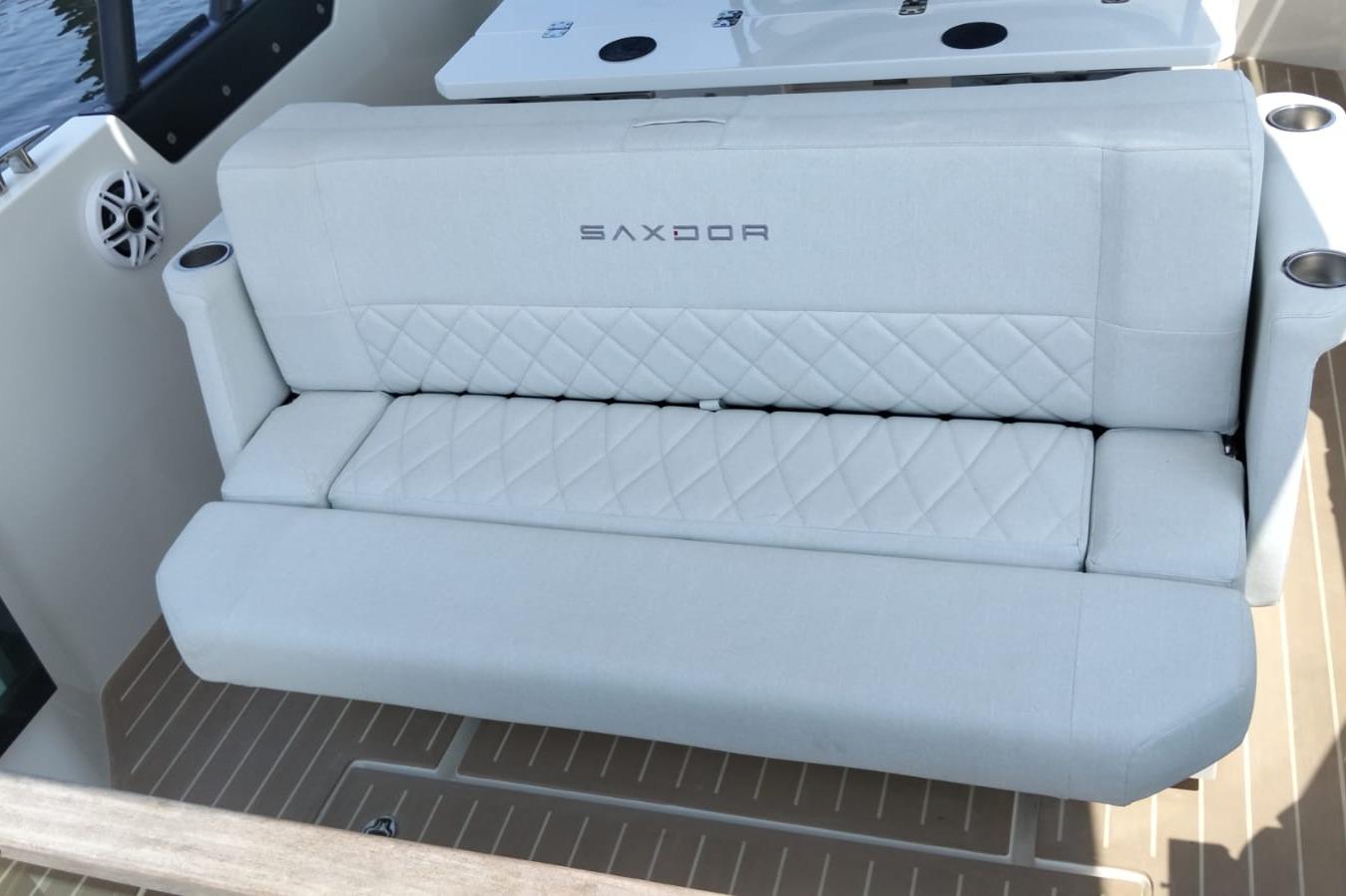 Luxurious seating on 2025 Saxdor 270 GTO boat with quilted upholstery.