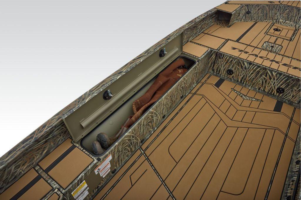 2026 Tracker Grizzly 1756 T Marsh boat interior with camo design and storage compartment.
