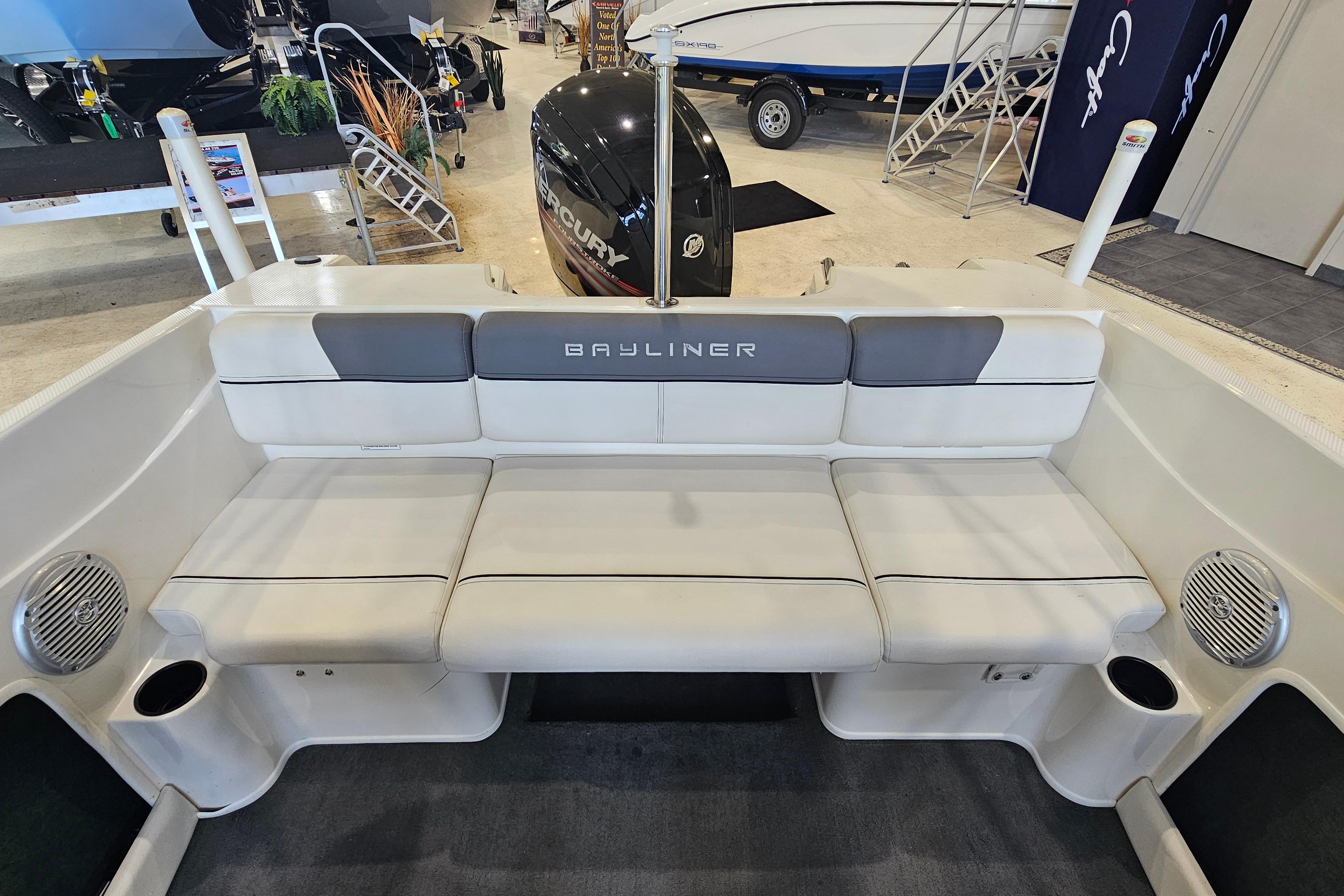 2019 Bayliner 170 Bowrider boat interior with cushioned seating and cup holders.