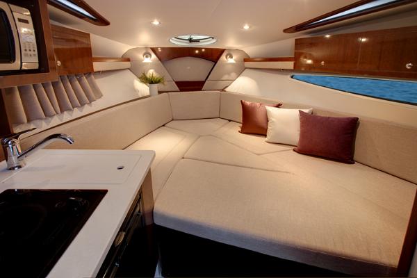 Manufacturer Provided Image: Interior of 2017 Four Winns Vista 275 boat with cozy seating and modern amenities.