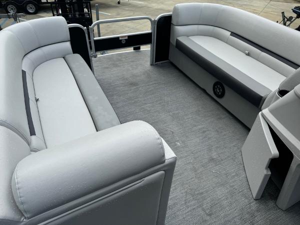 2023 Godfrey 2286 boat interior with gray seating and carpeted floor.