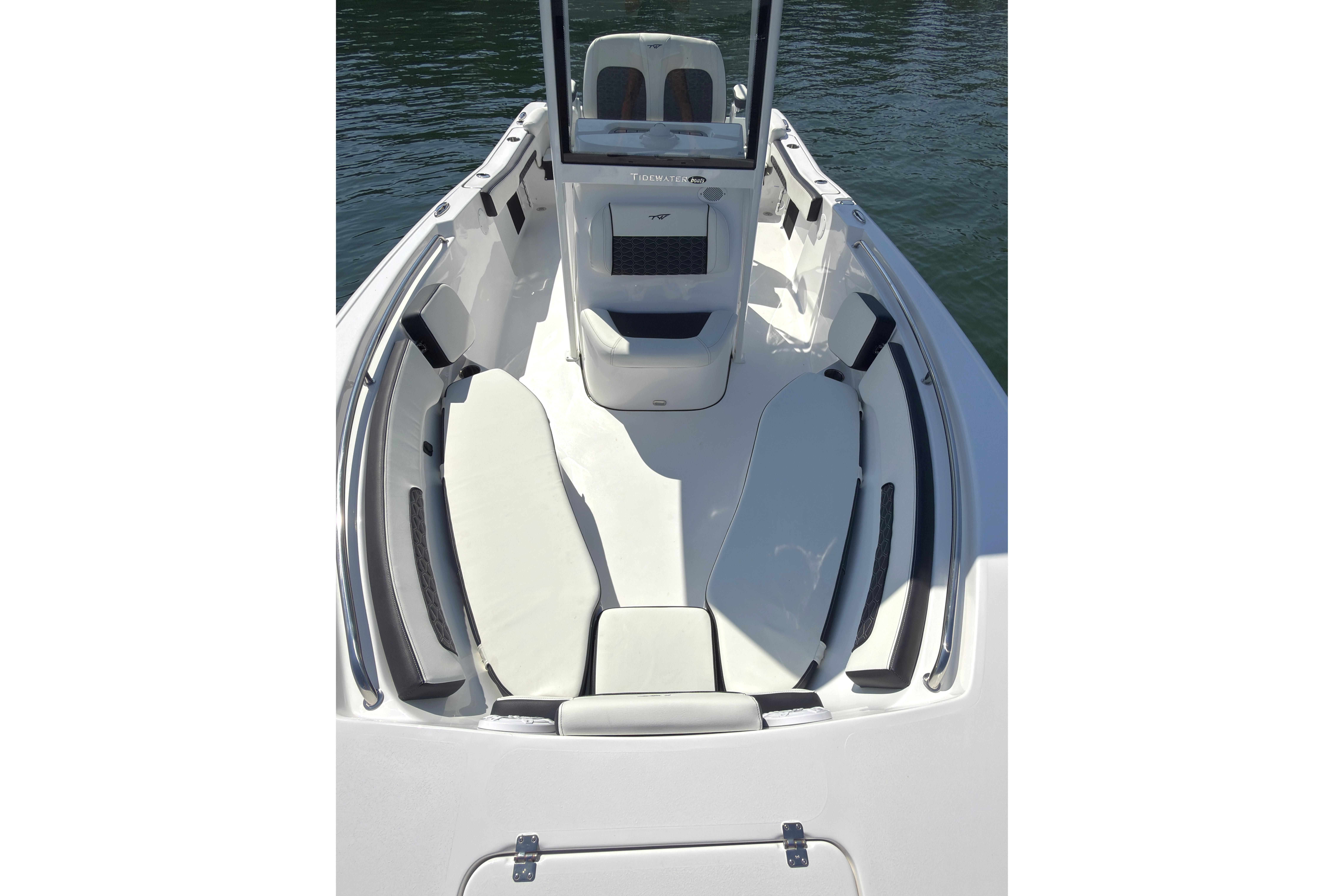 2026 Tidewater 220 LXF boat interior with cushioned seating and sleek design.