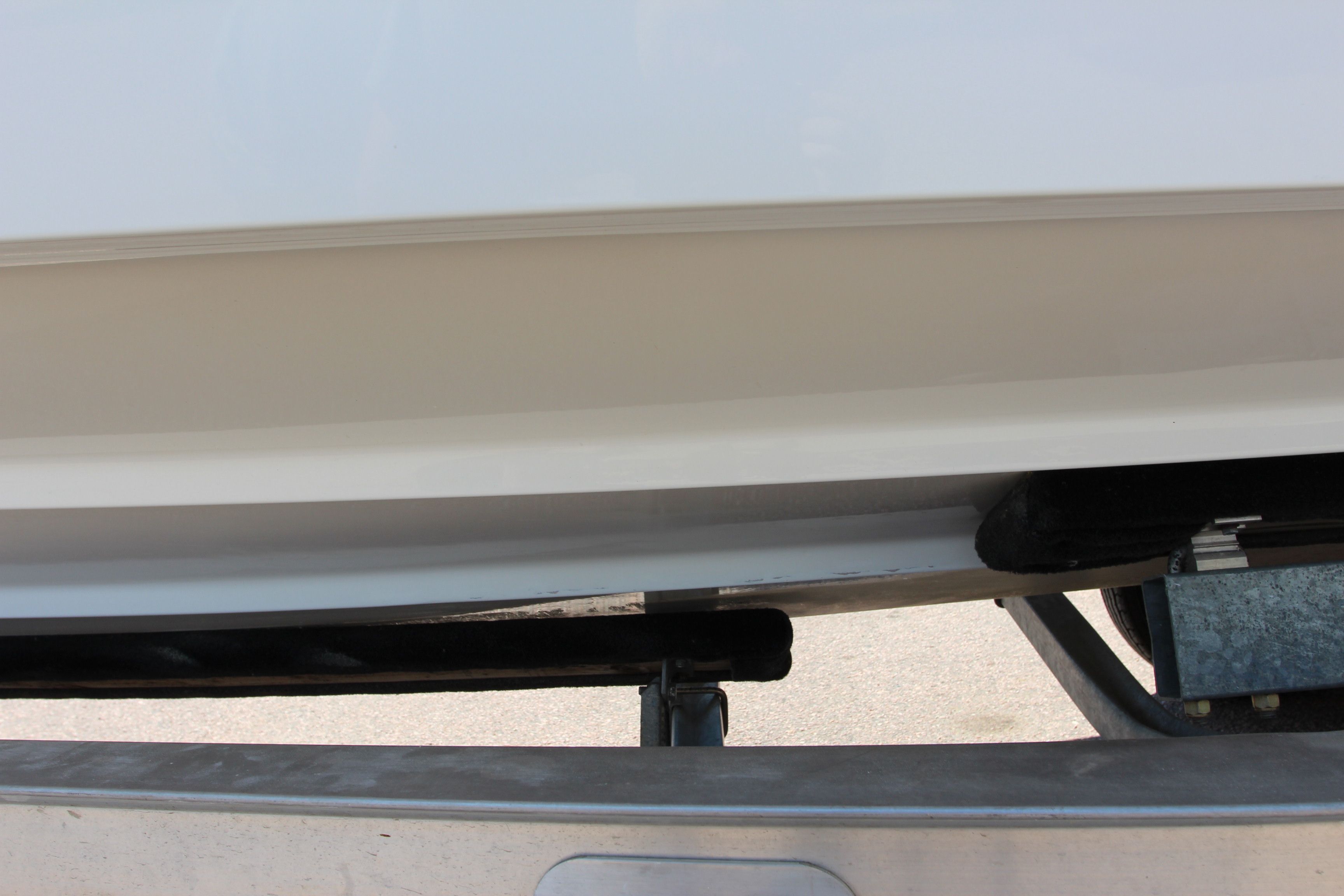 Close-up of a Monterey 268SSC boat hull on a trailer.