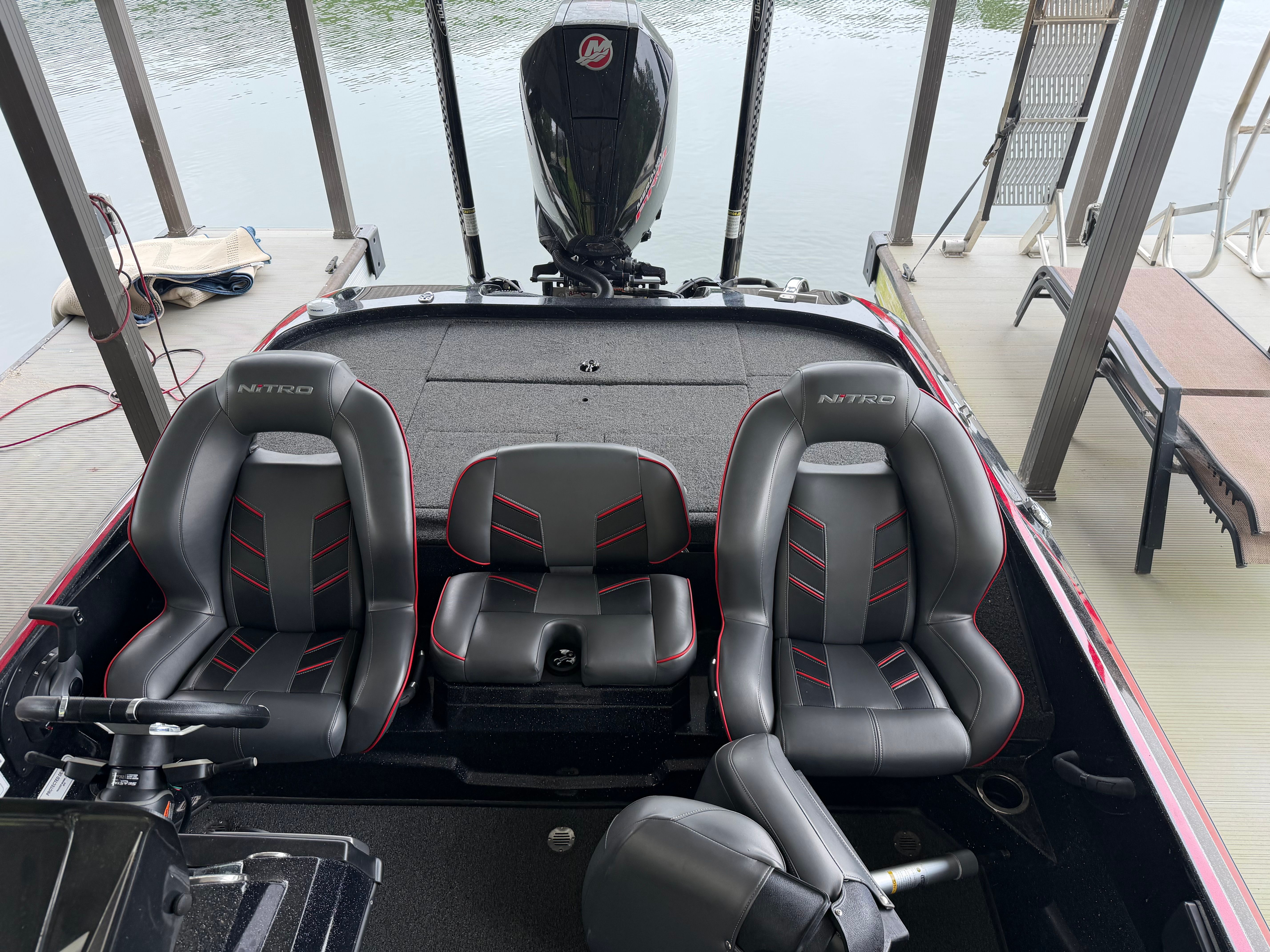 The image shows the interior of a 2024 Tracker Z19 boat with three seats.
