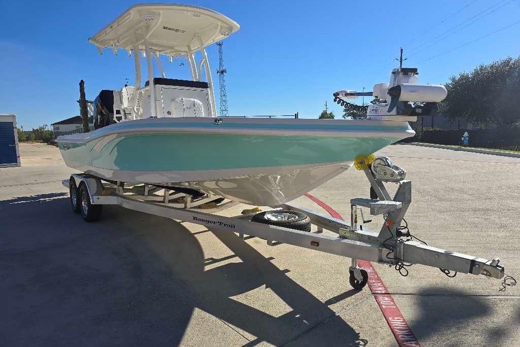 2025 Ranger 2510 Bay boat on trailer in sunny outdoor setting.