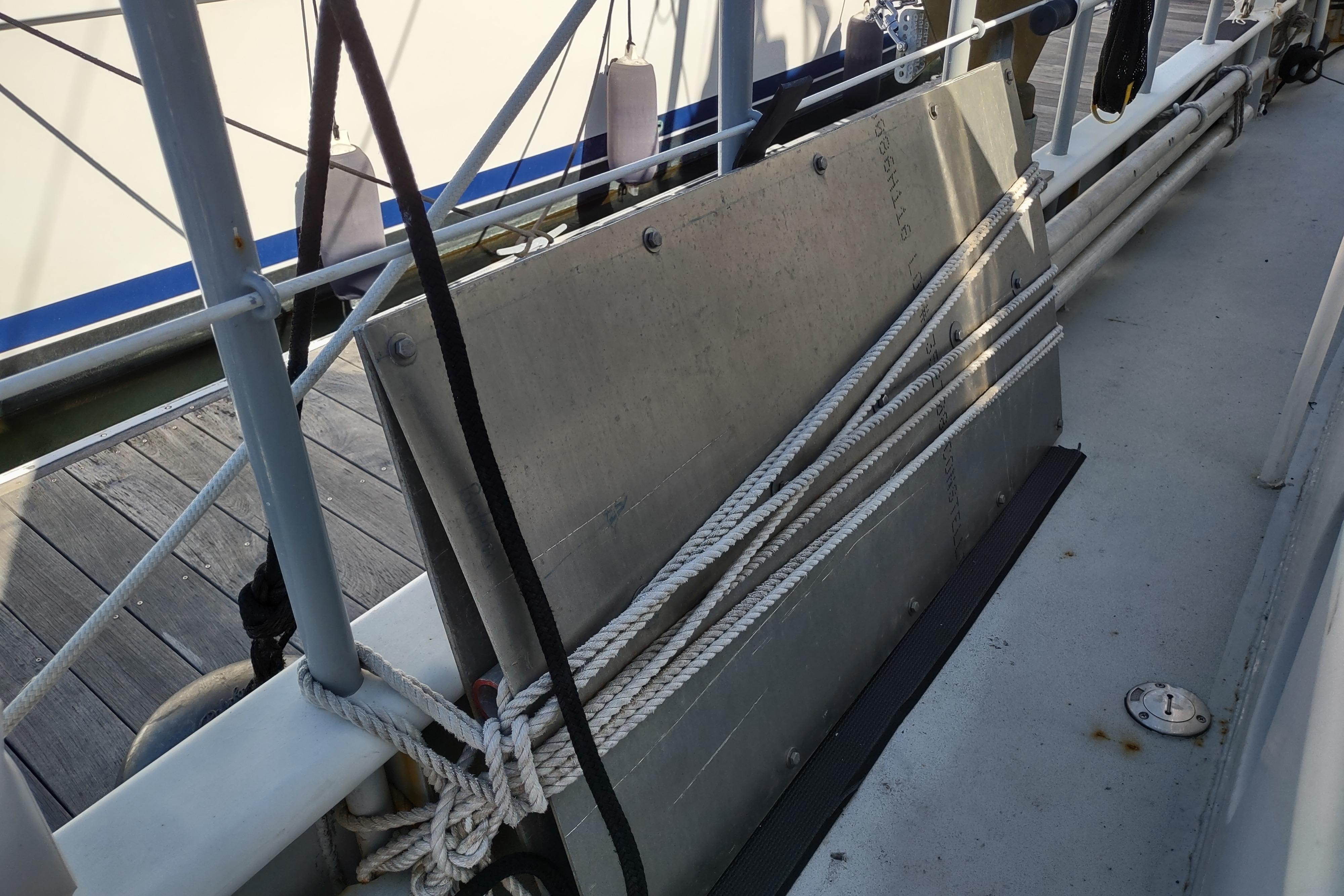 Rope and metal panel on Custom Sprague boat deck, 2006 model.